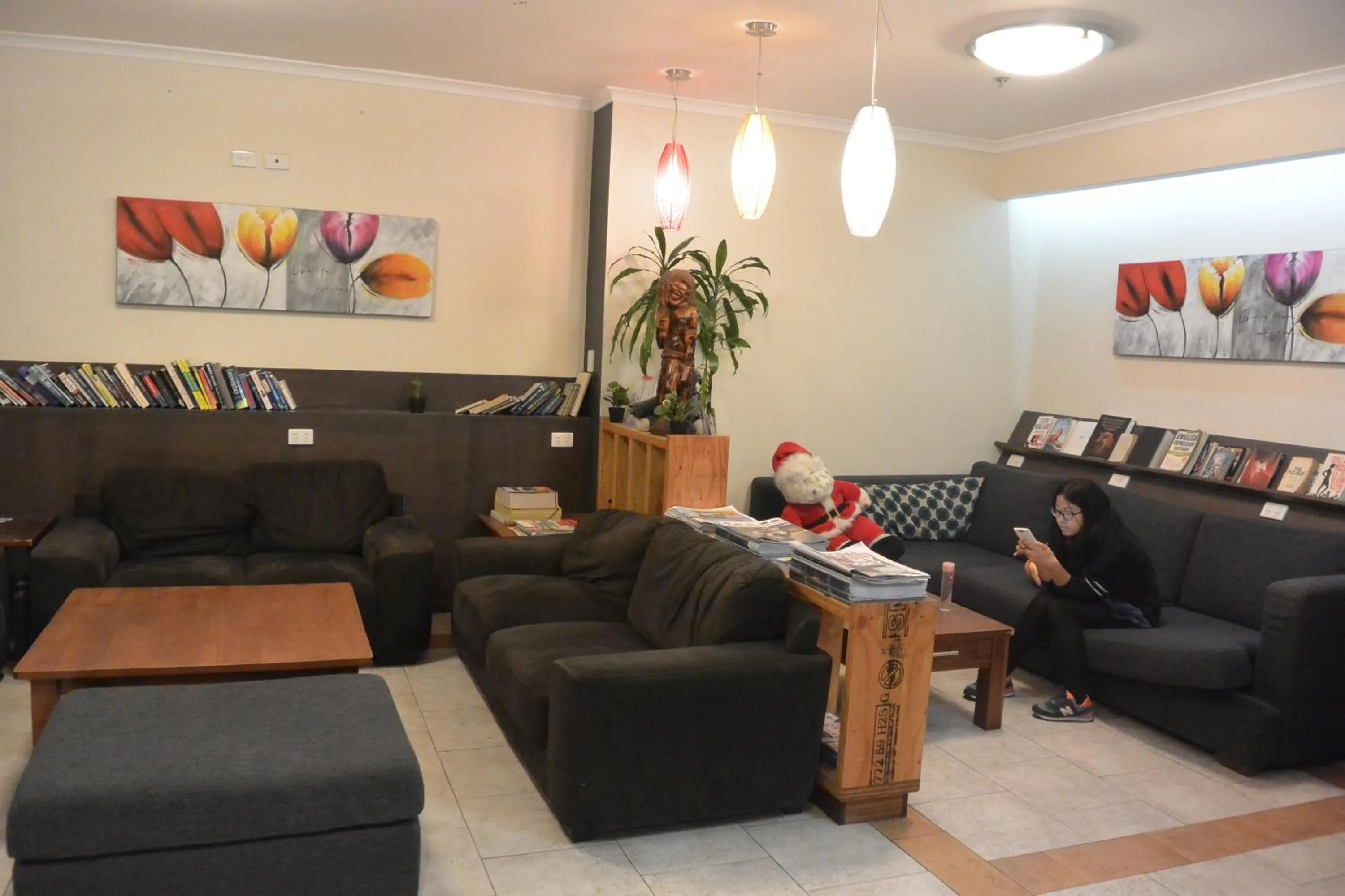 Communal lounge/ TV room in Elizabeth Hostel