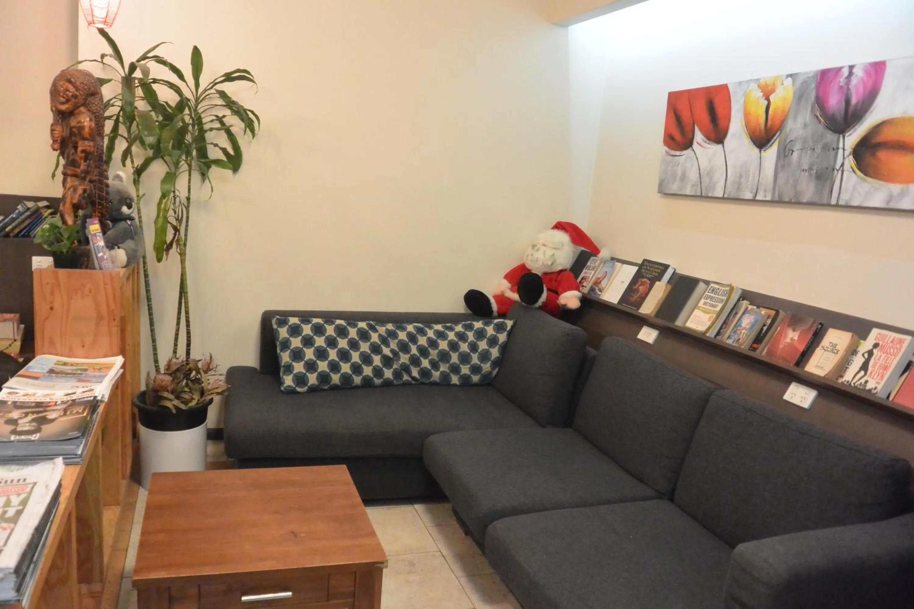 Communal lounge/ TV room in Elizabeth Hostel