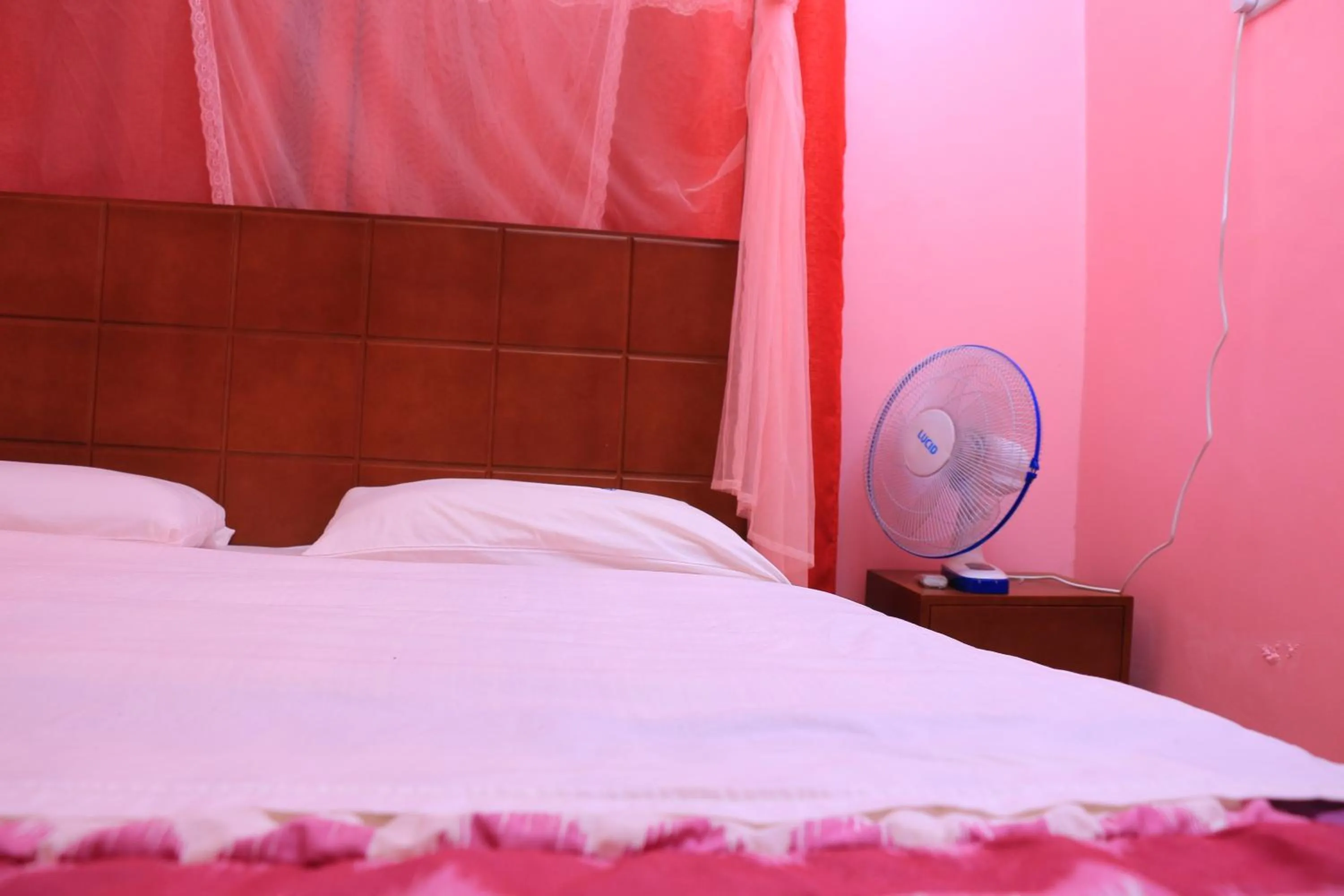 Bed in Marina Terraces Hotel