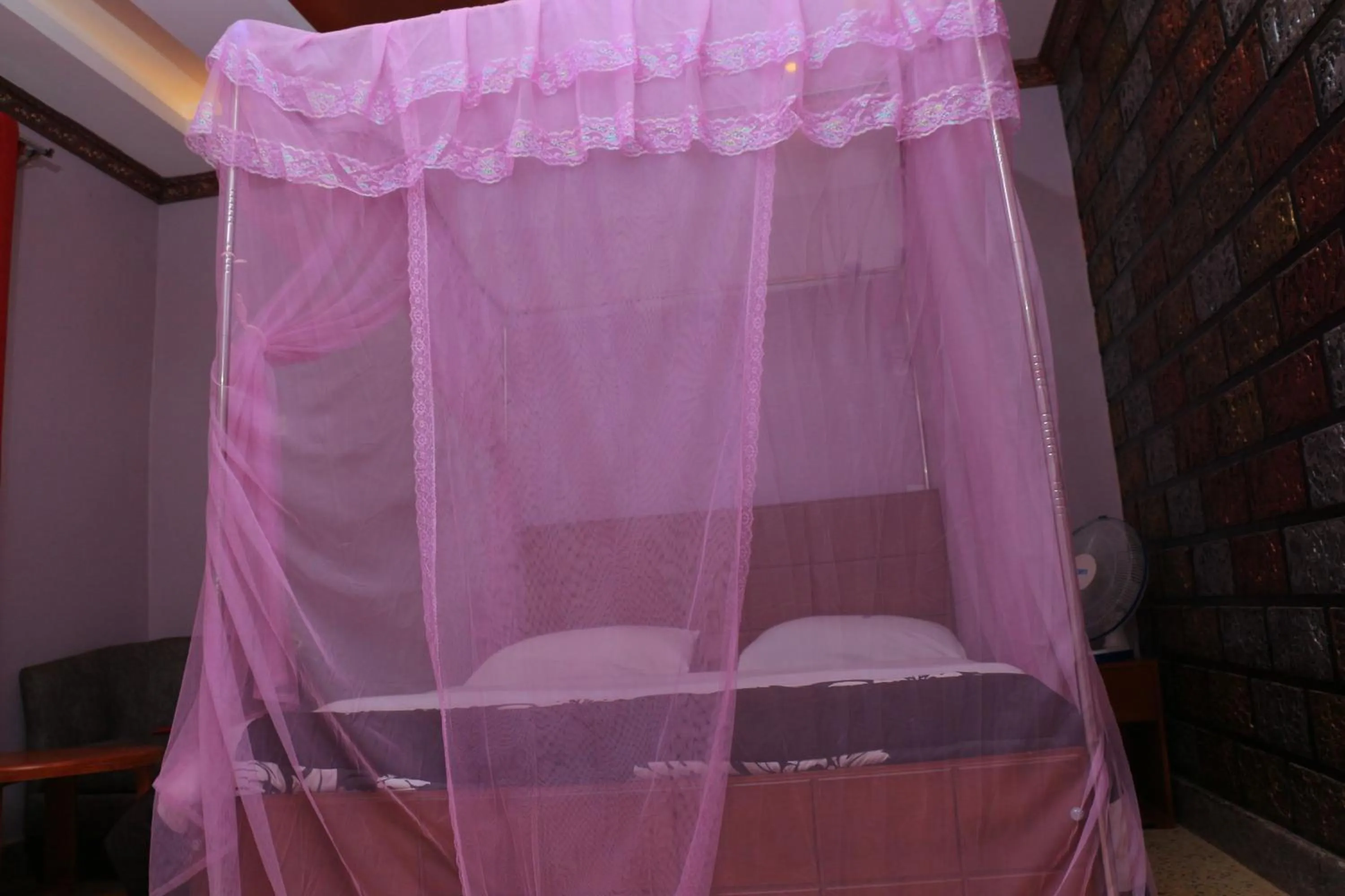 Bed in Marina Terraces Hotel