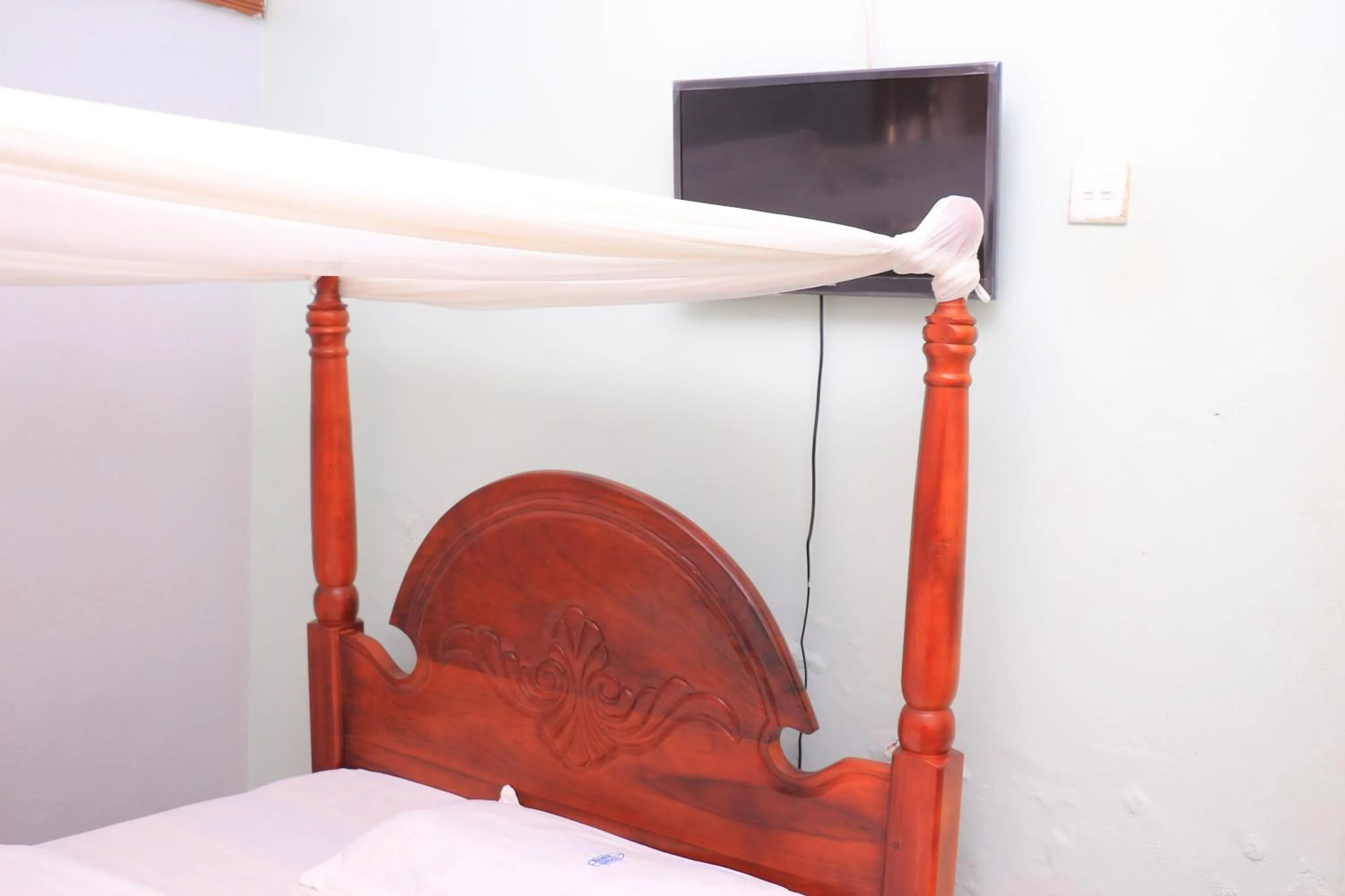 Bed in Marina Terraces Hotel