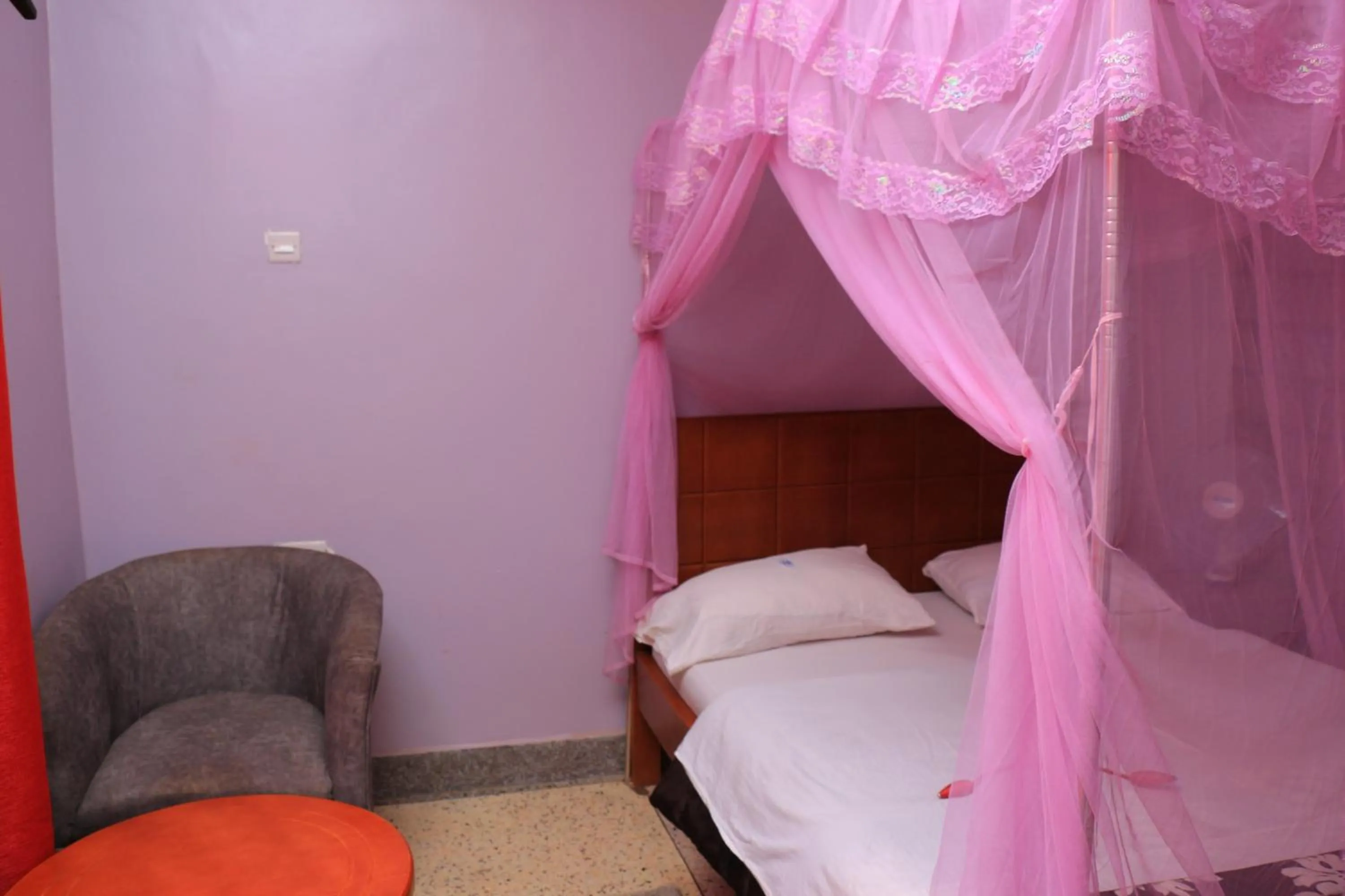 Bed in Marina Terraces Hotel