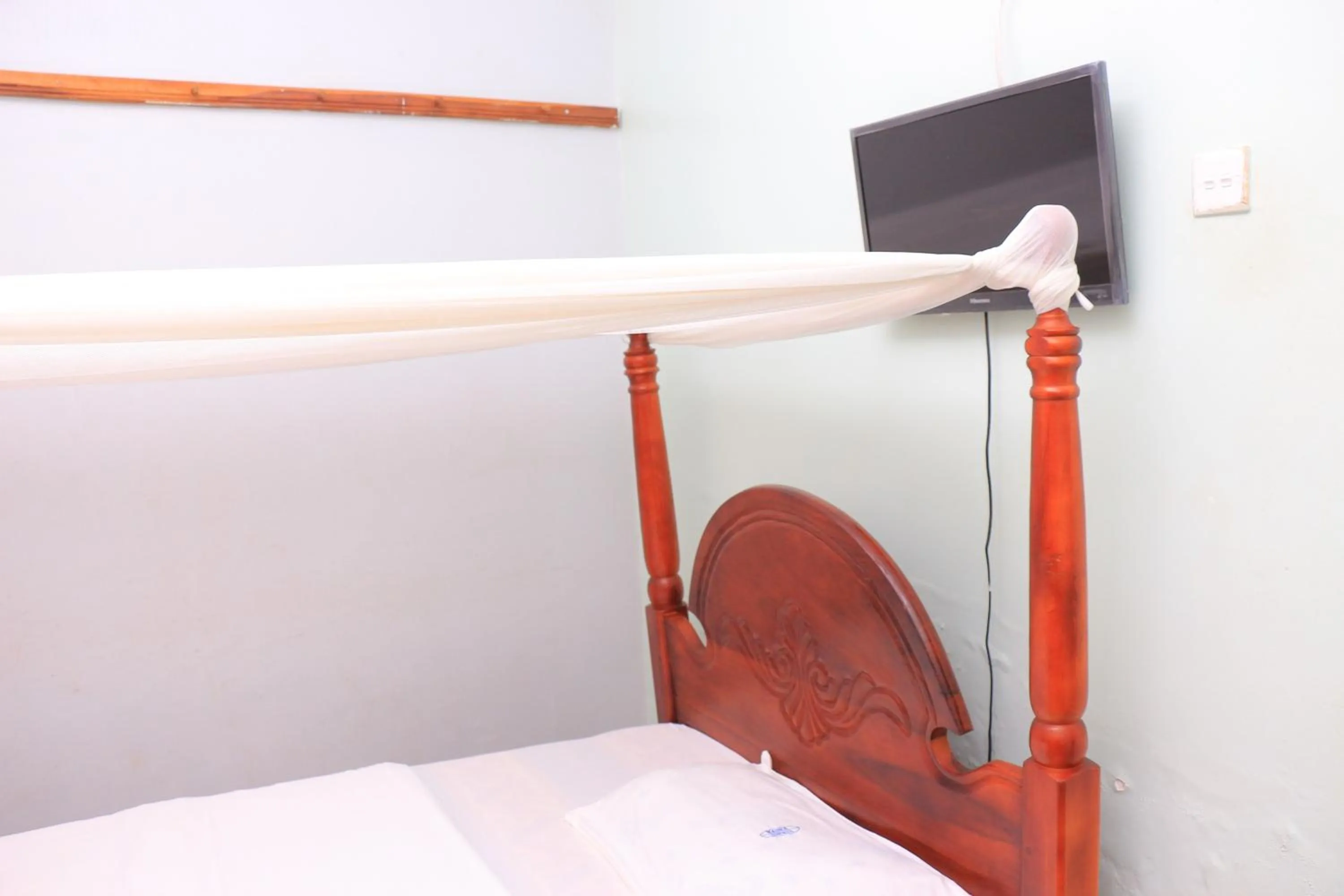 Bed in Marina Terraces Hotel