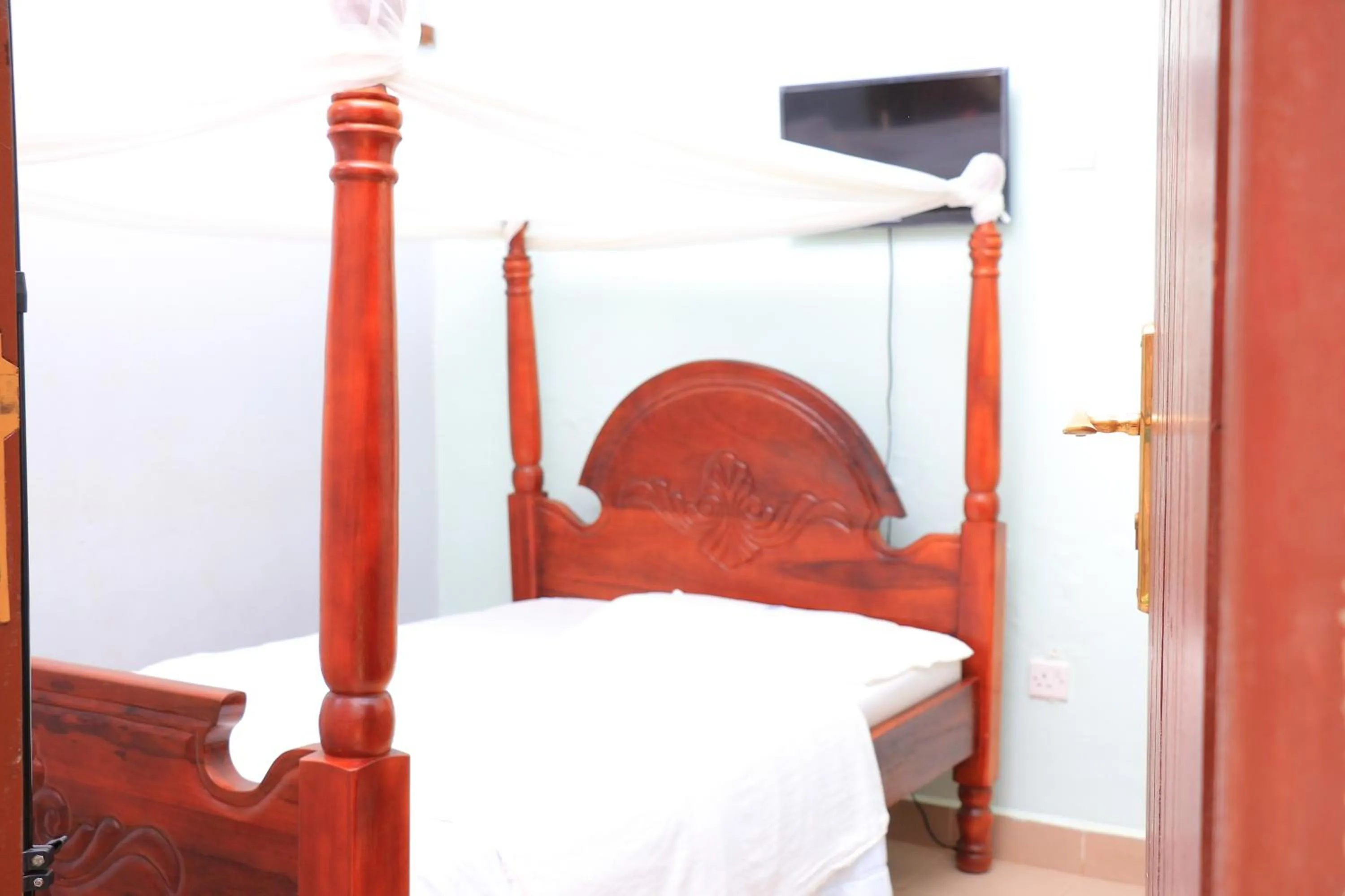 Bed in Marina Terraces Hotel