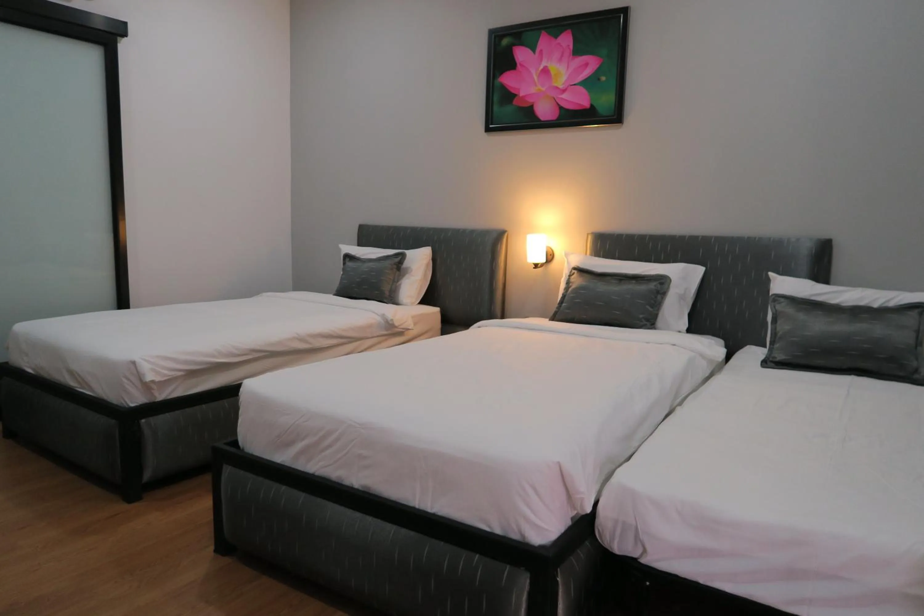 Bed in The Mira Hotel Chiang Rai