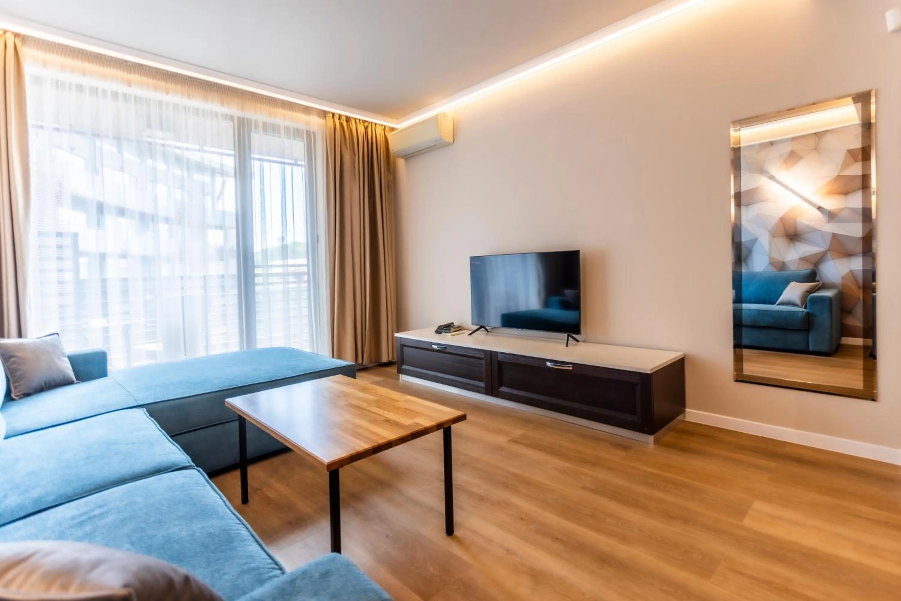 Communal lounge/ TV room in Galeon Residence & SPA