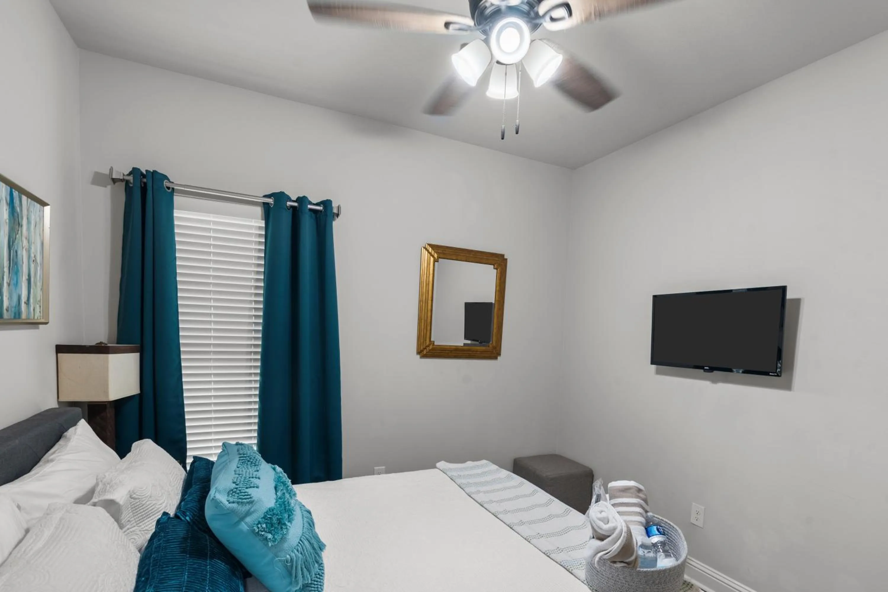 Bed in Zen House, a peaceful sanctuary in Shreveport, LA! Tv in each room