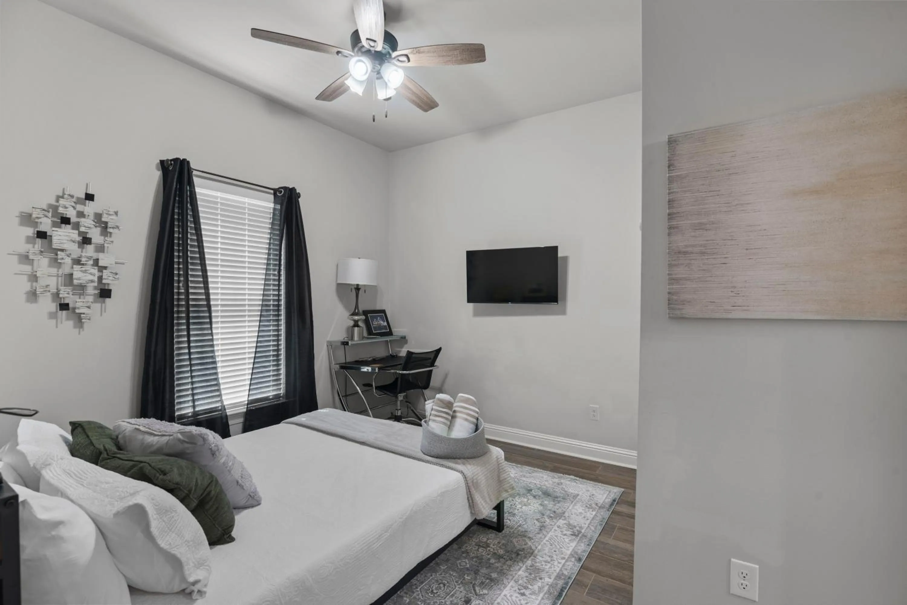 Bed in Zen House, a peaceful sanctuary in Shreveport, LA! Tv in each room