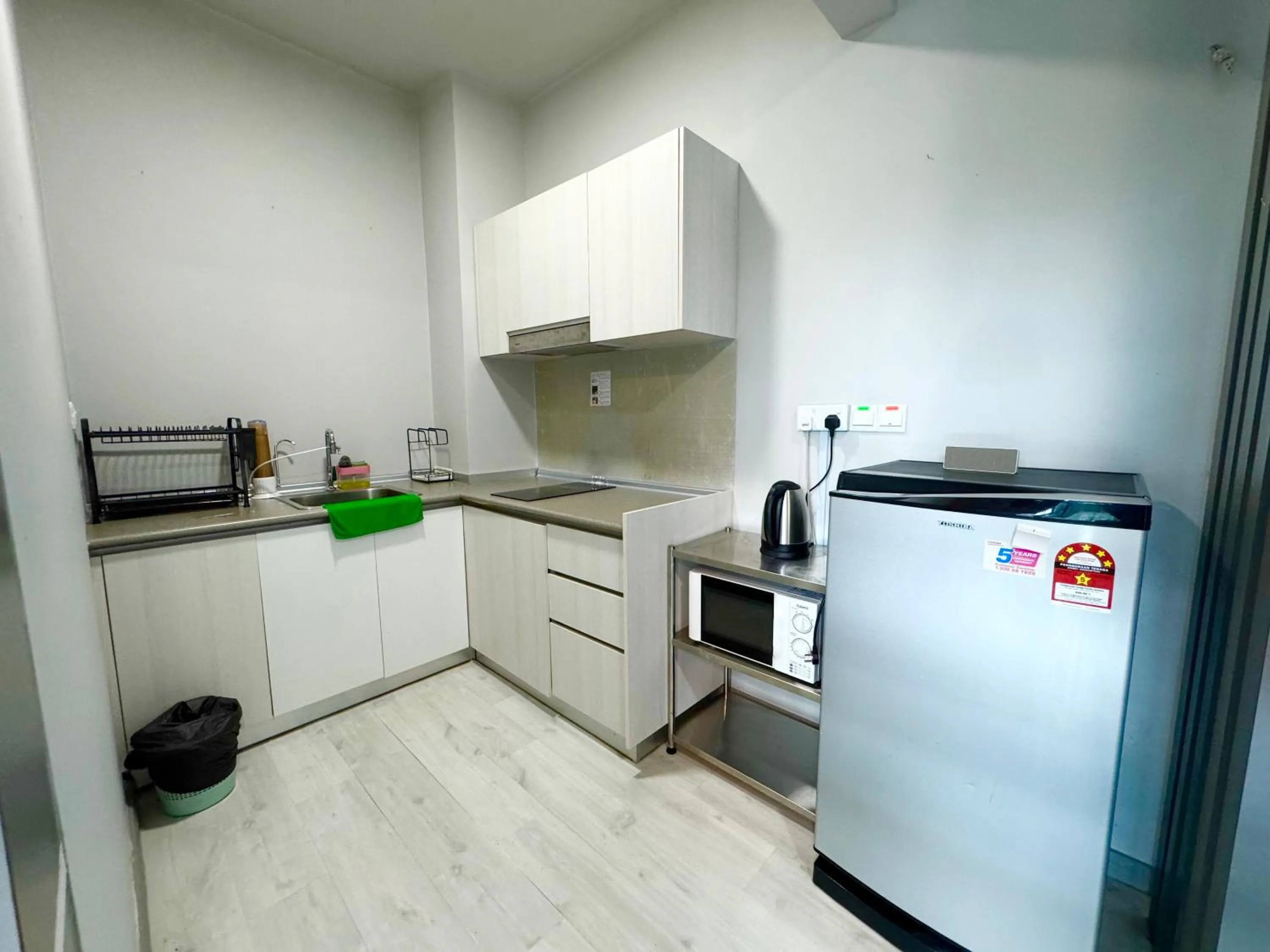 Kitchen or kitchenette in Sunset Seaview Vacation Condos @ Jesselton Quay