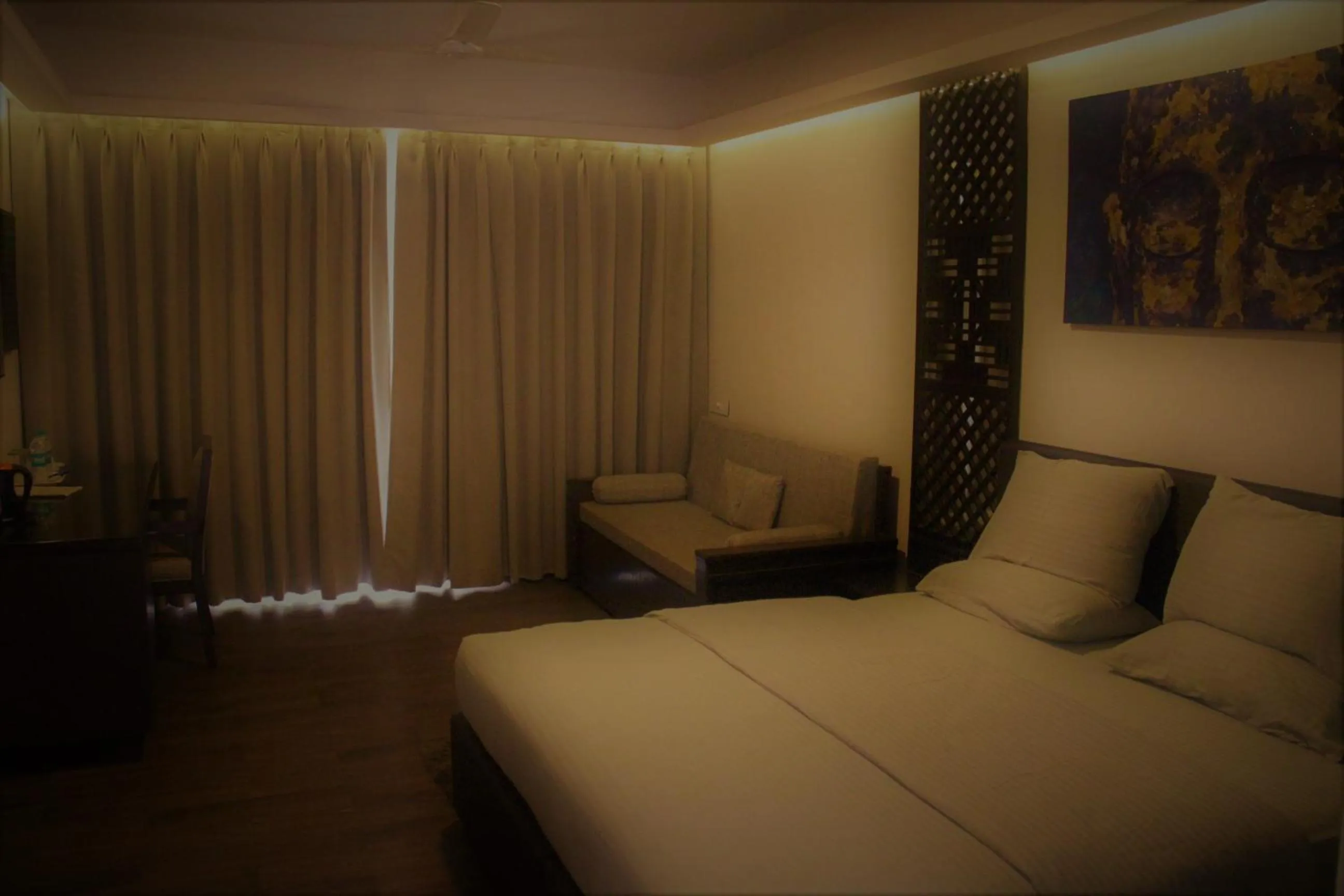 Bed in Lotus Sutra Beachfront Resort