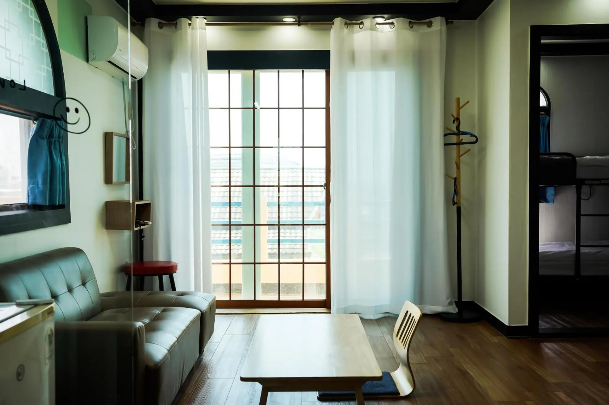 Living room, Bed in ttottot Jeju Backpackers