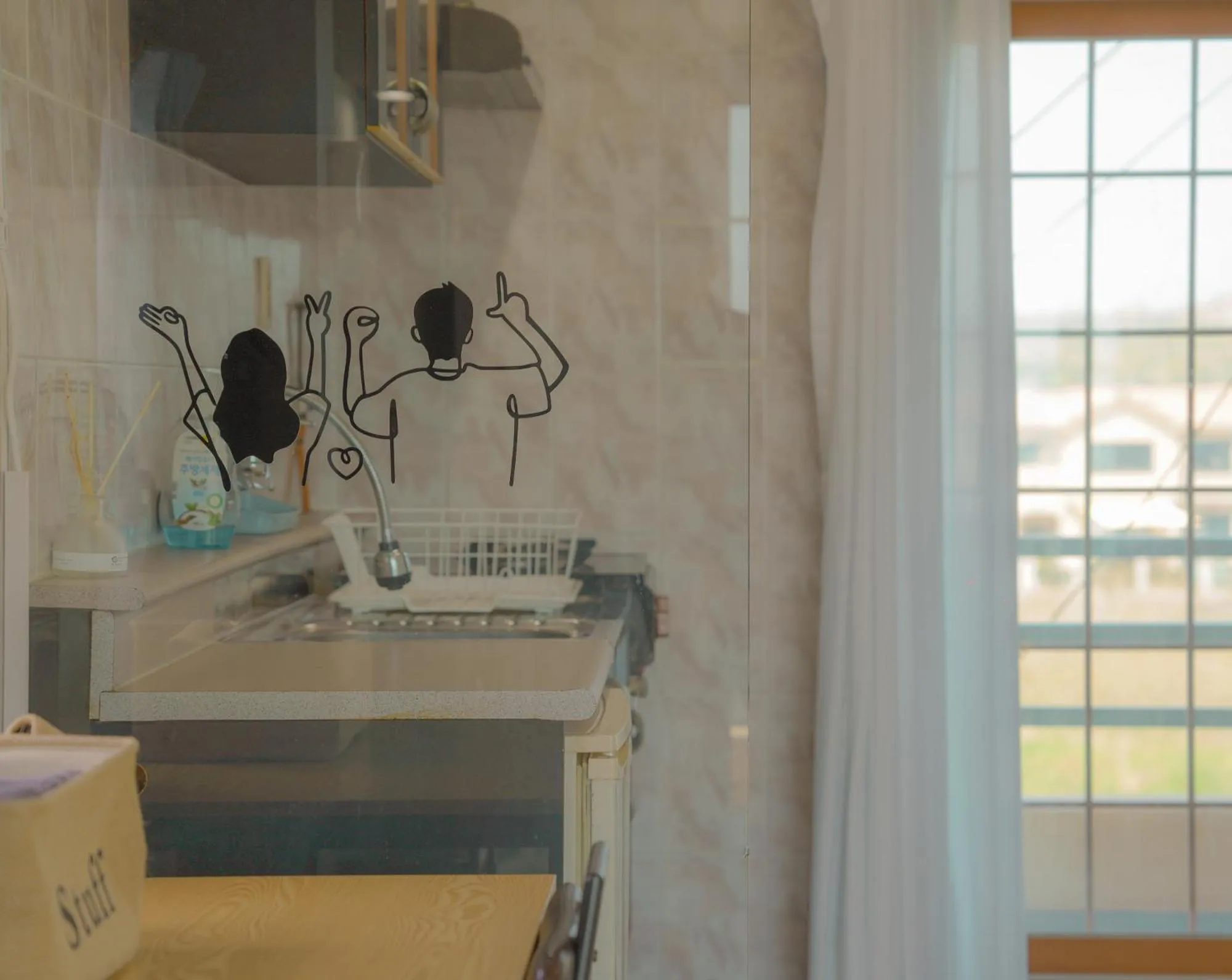 Kitchen or kitchenette in ttottot Jeju Backpackers