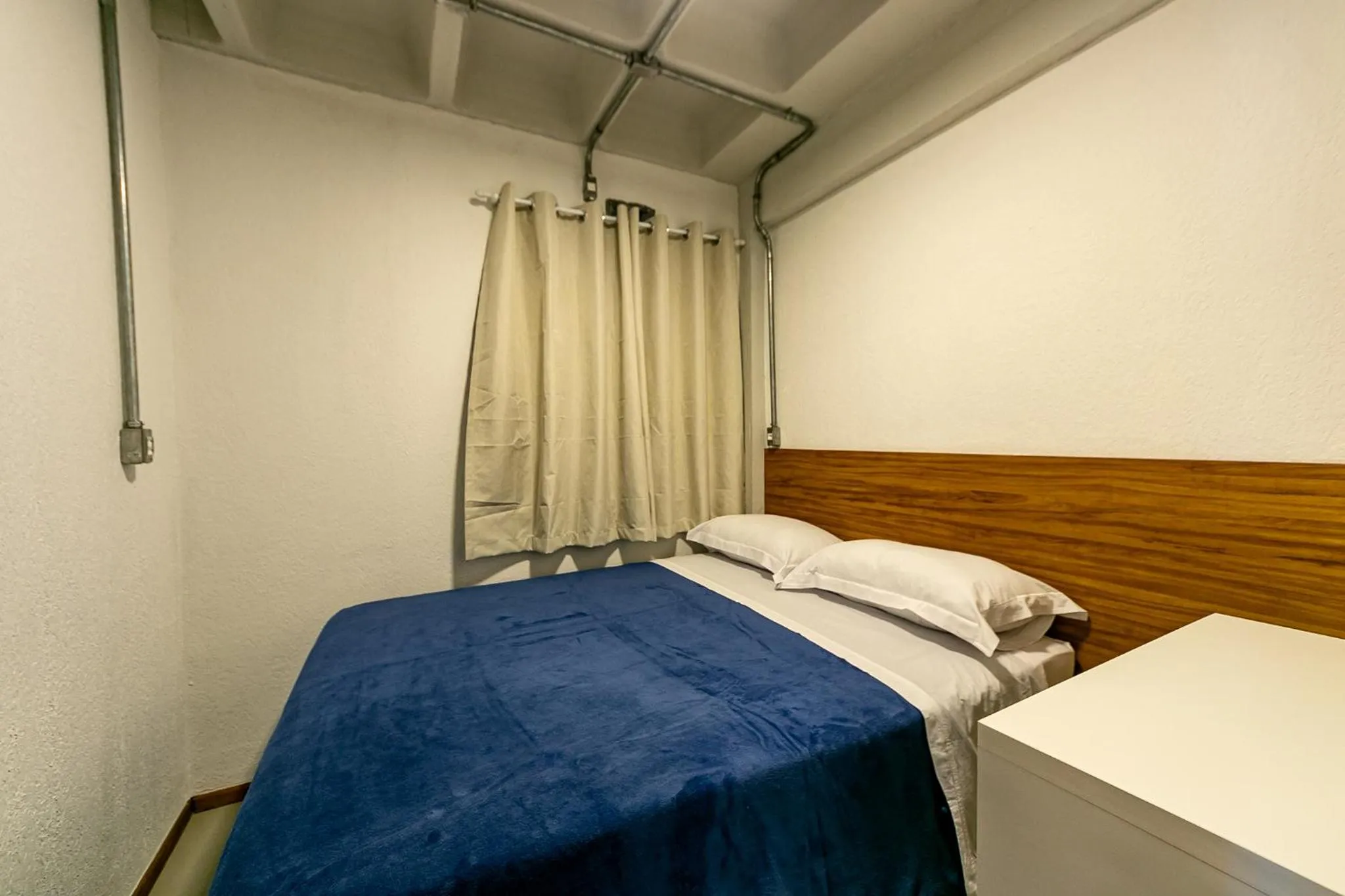 Bed in Antiquus ApartHotel