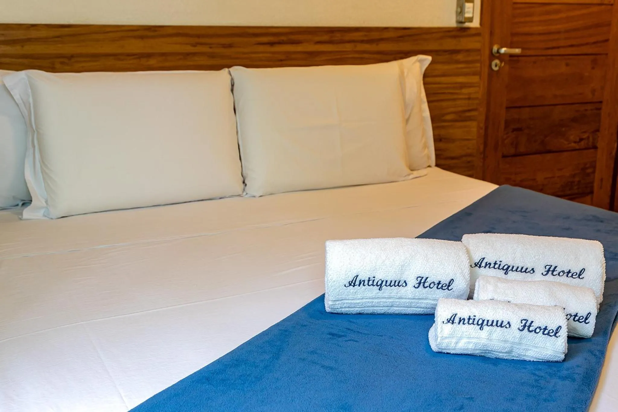 Bed in Antiquus ApartHotel