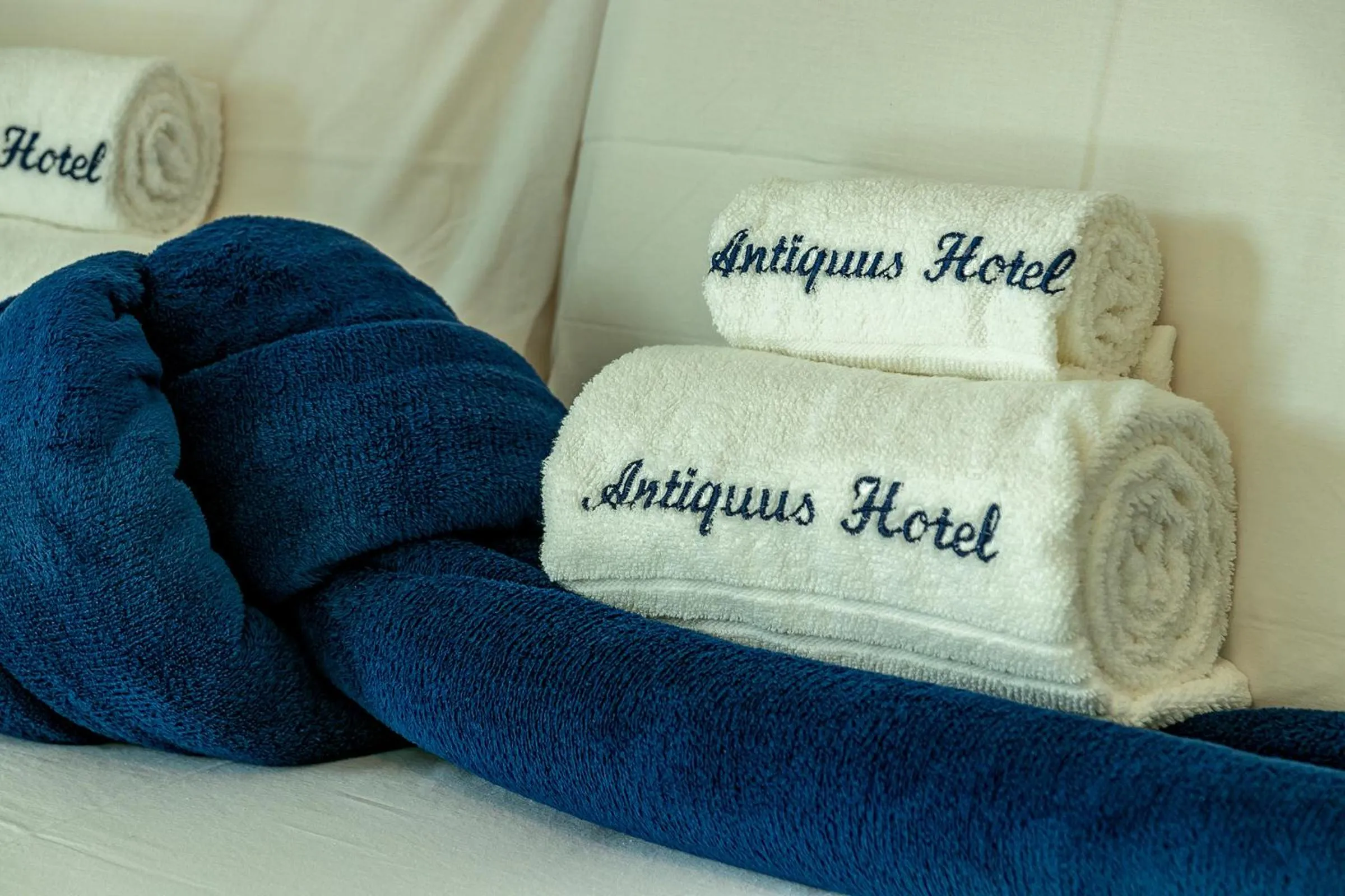 towels, Bed in Antiquus ApartHotel