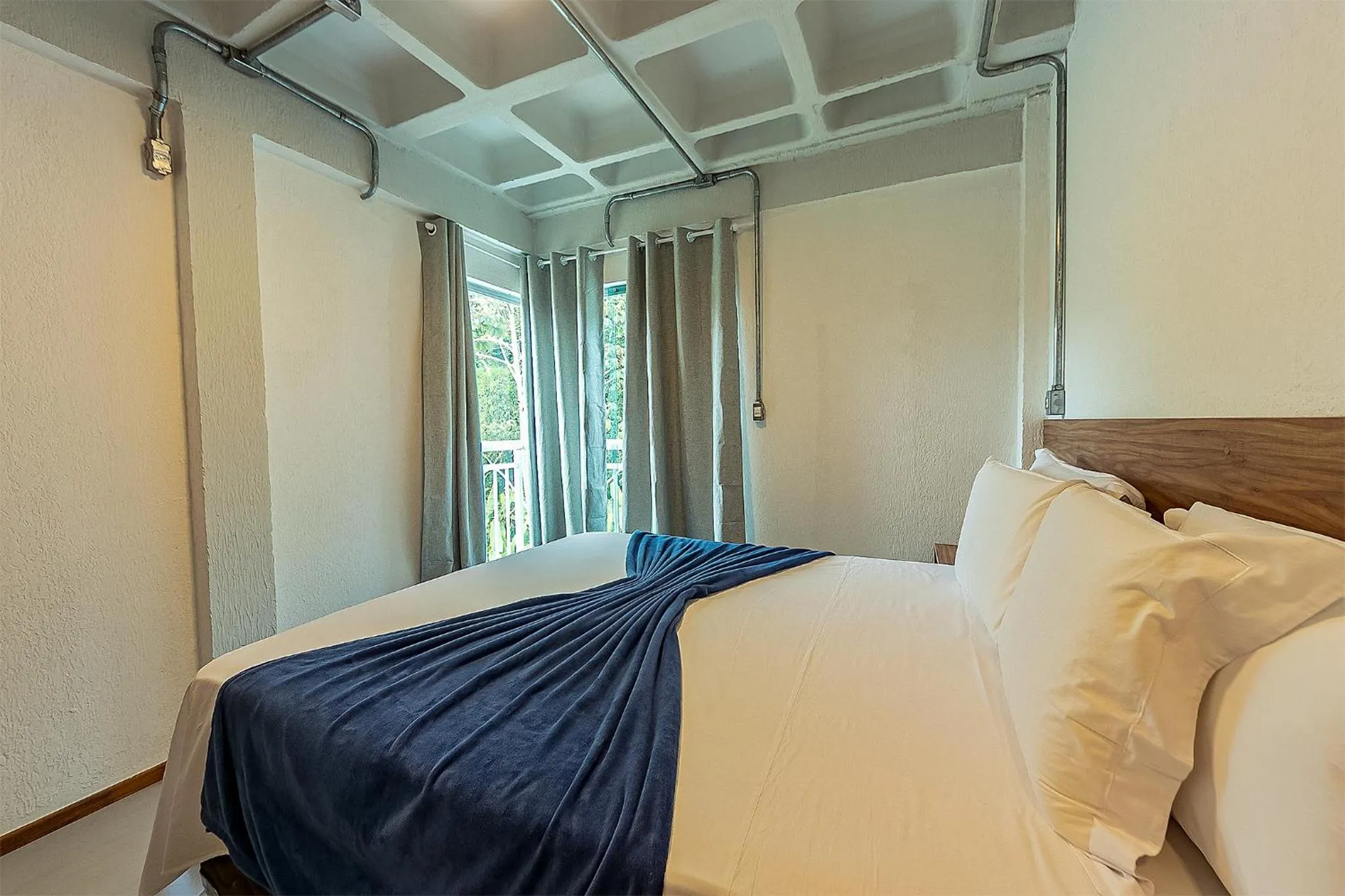 Bed in Antiquus ApartHotel