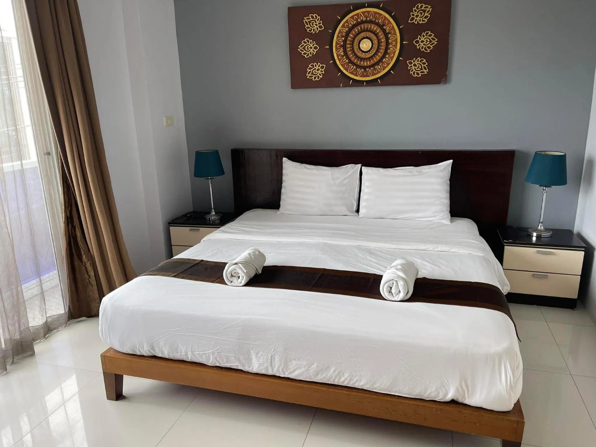 Bed in La Xenia Hotel Kata Beach