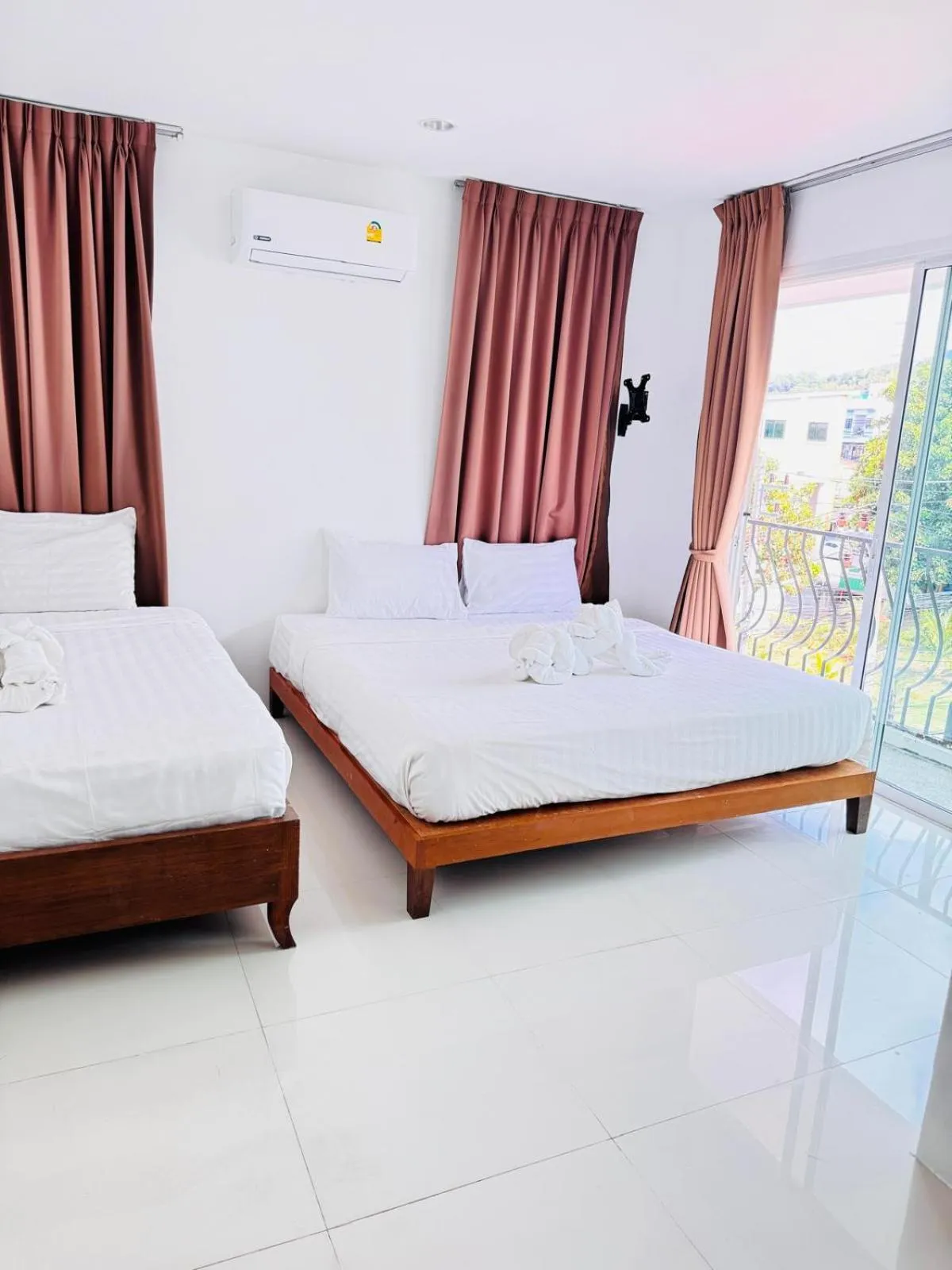 Bed in La Xenia Hotel Kata Beach