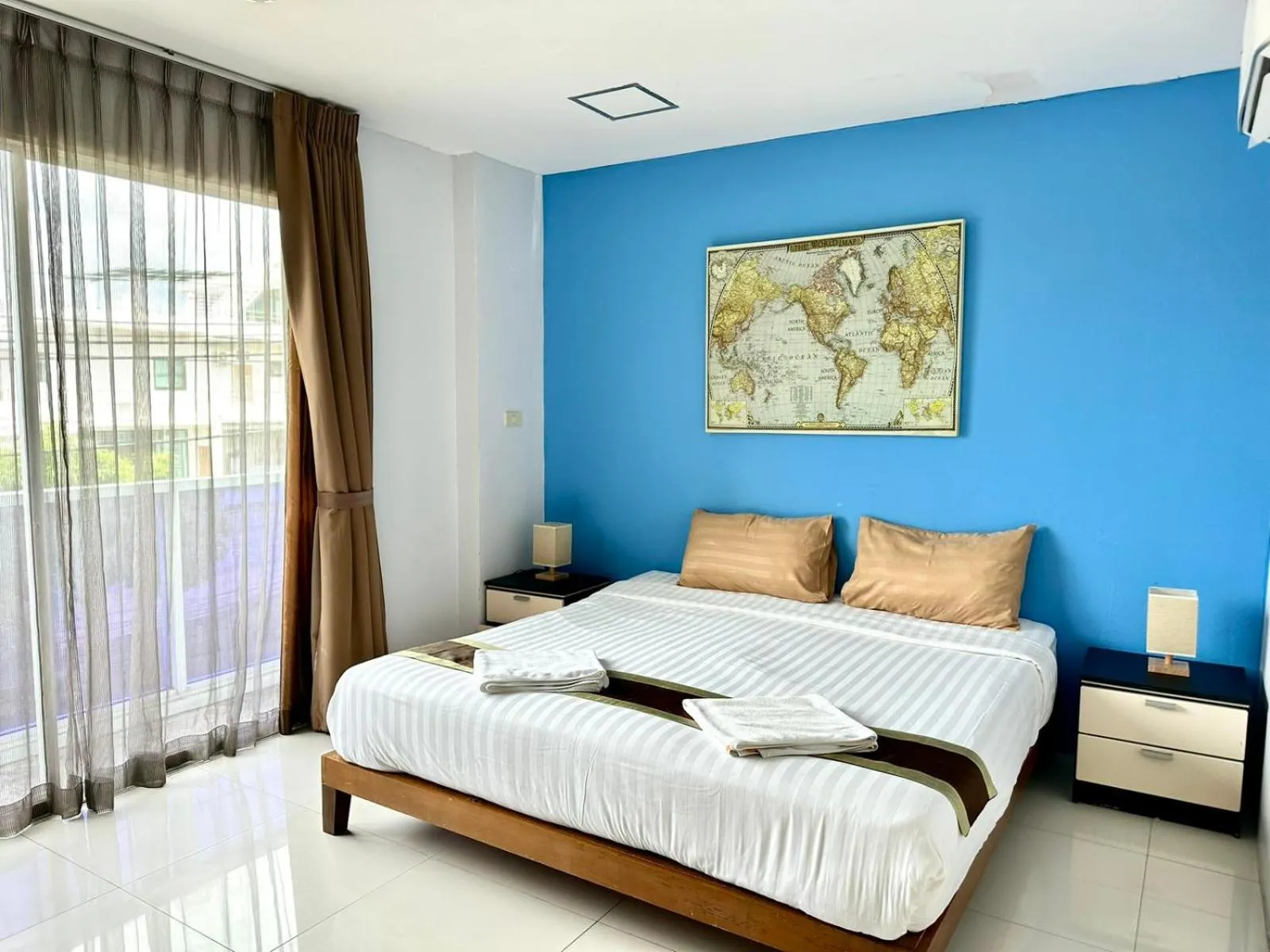 Bed in La Xenia Hotel Kata Beach