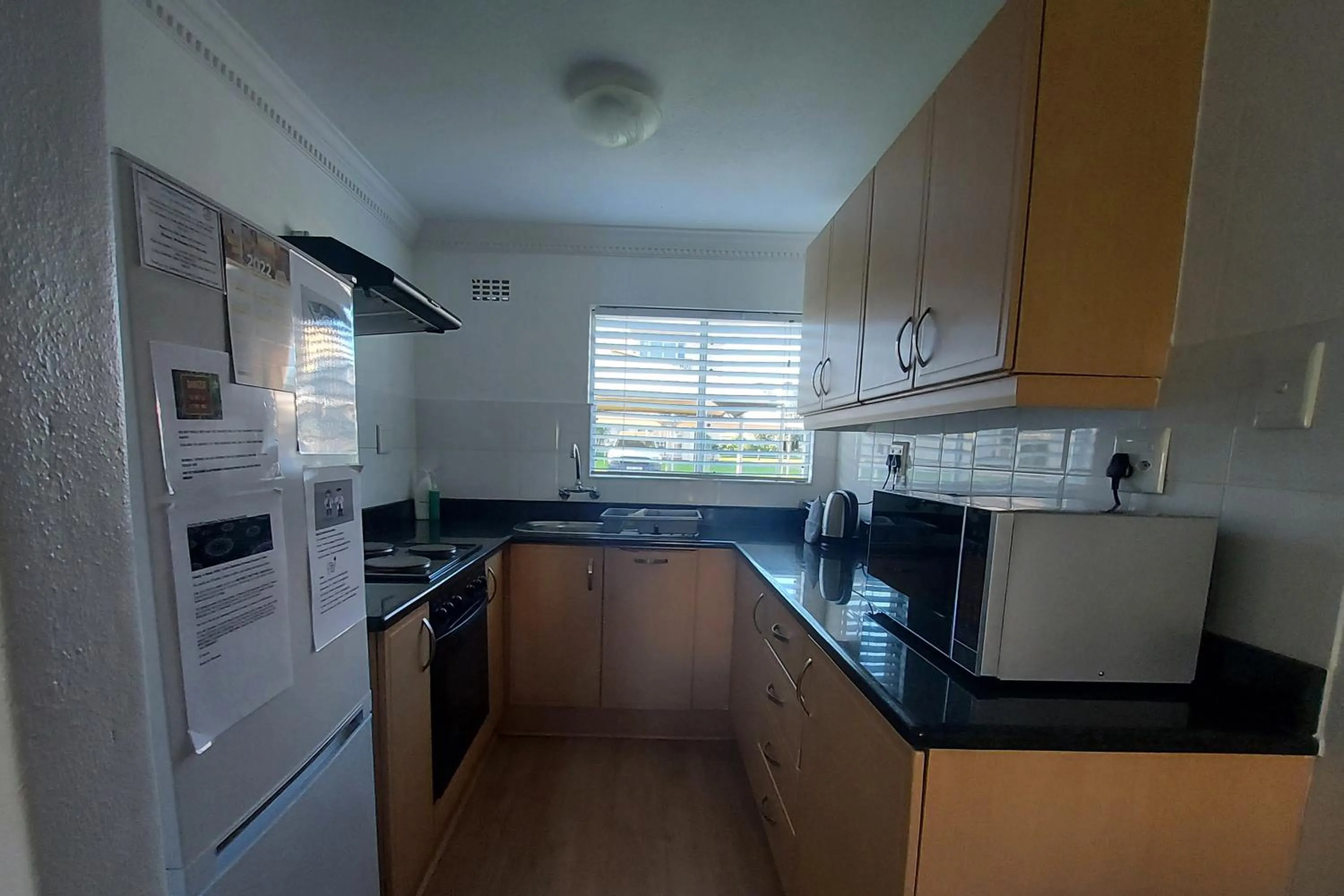 Kitchen or kitchenette in First Group Hermanus Beach Club