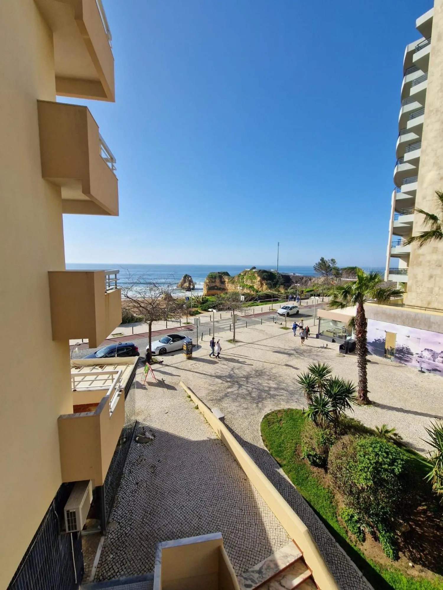 Property building in Modern flat with sea view and direct beach access
