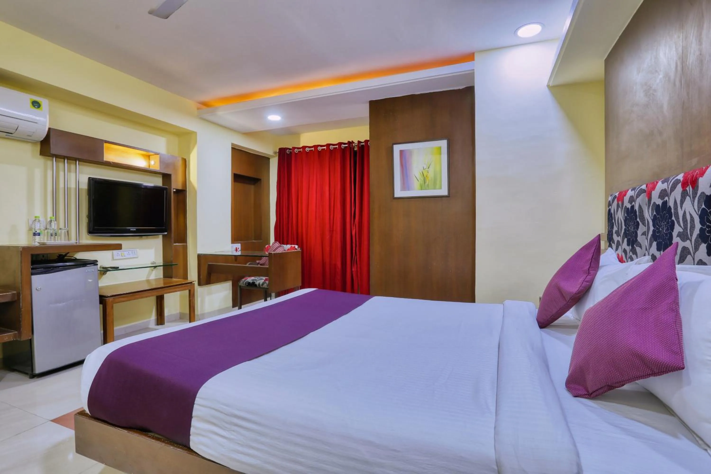 Bed in Hotel Amrit Residency