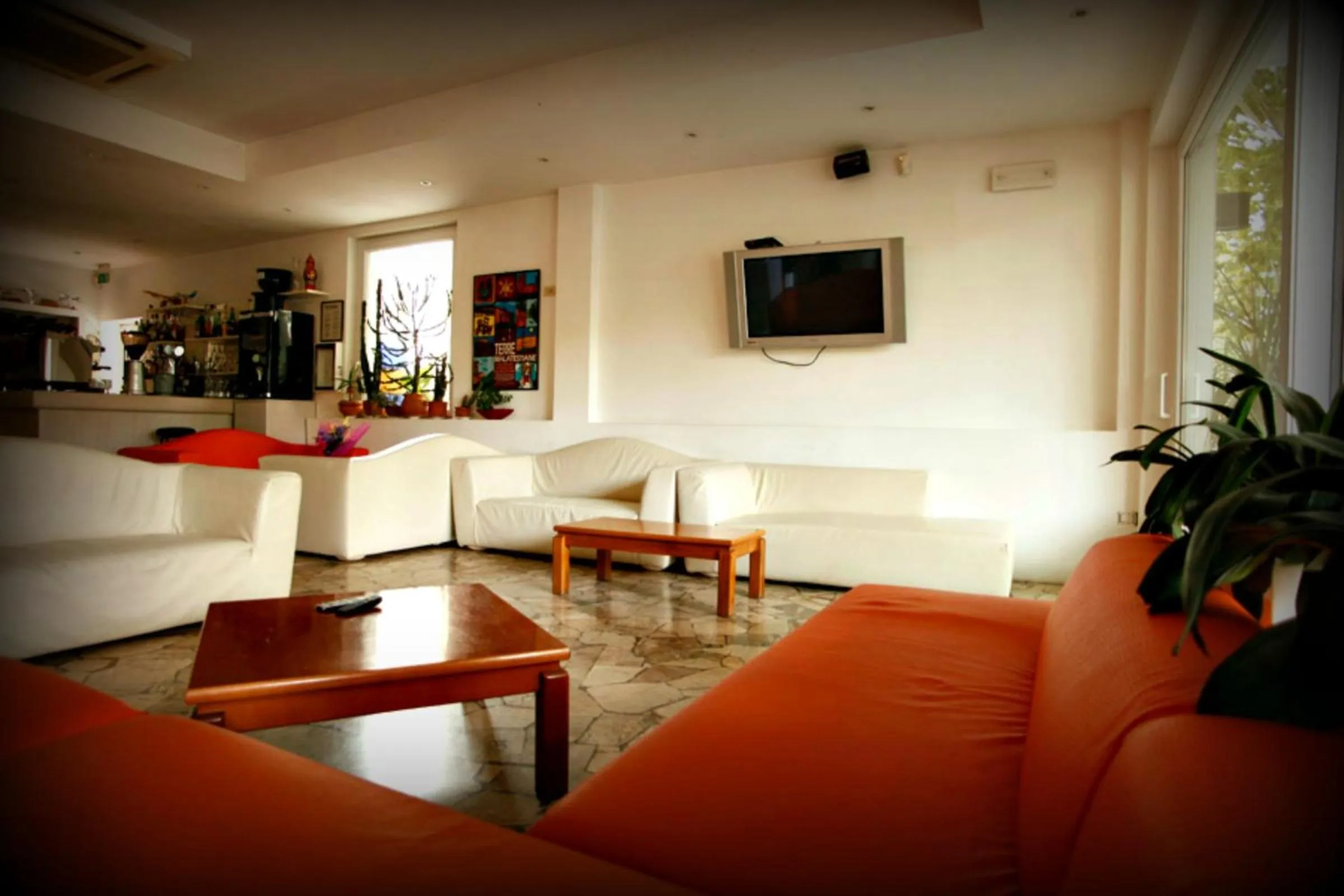 Communal lounge/ TV room in Hotel Marebello