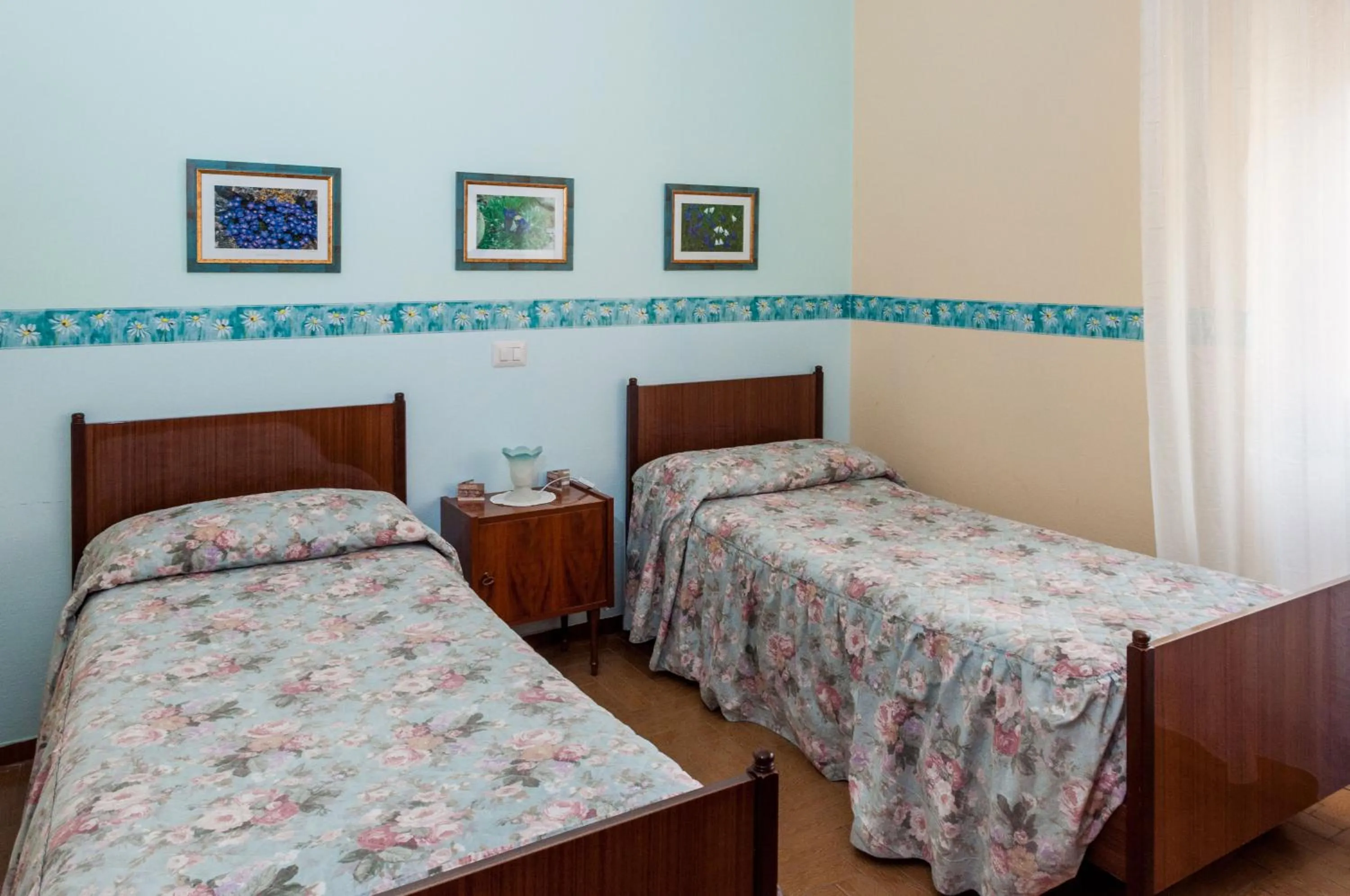 Bedroom in Albergo De Jean