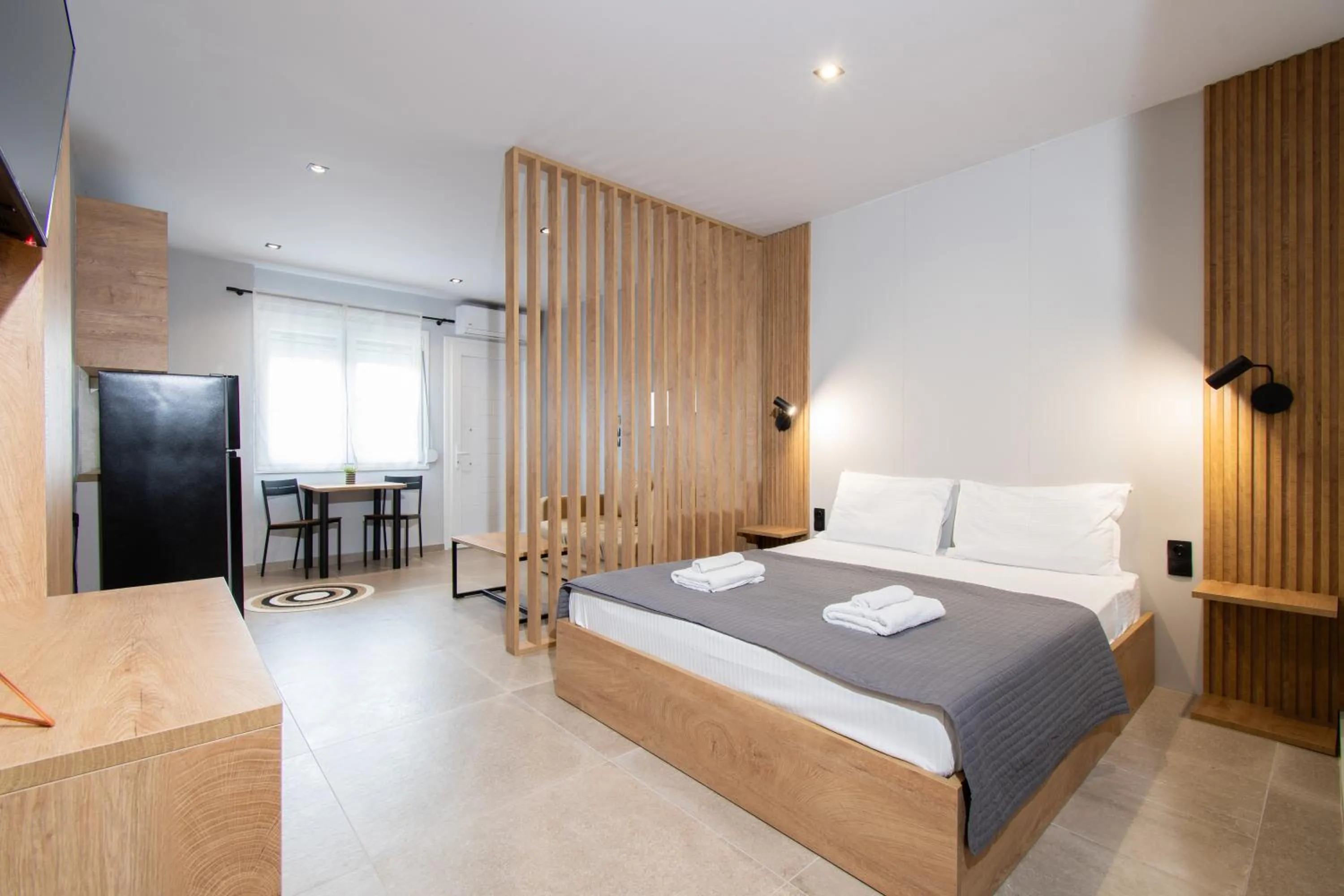 Photo of the whole room, Bed in Unique Aura Luxury Studios