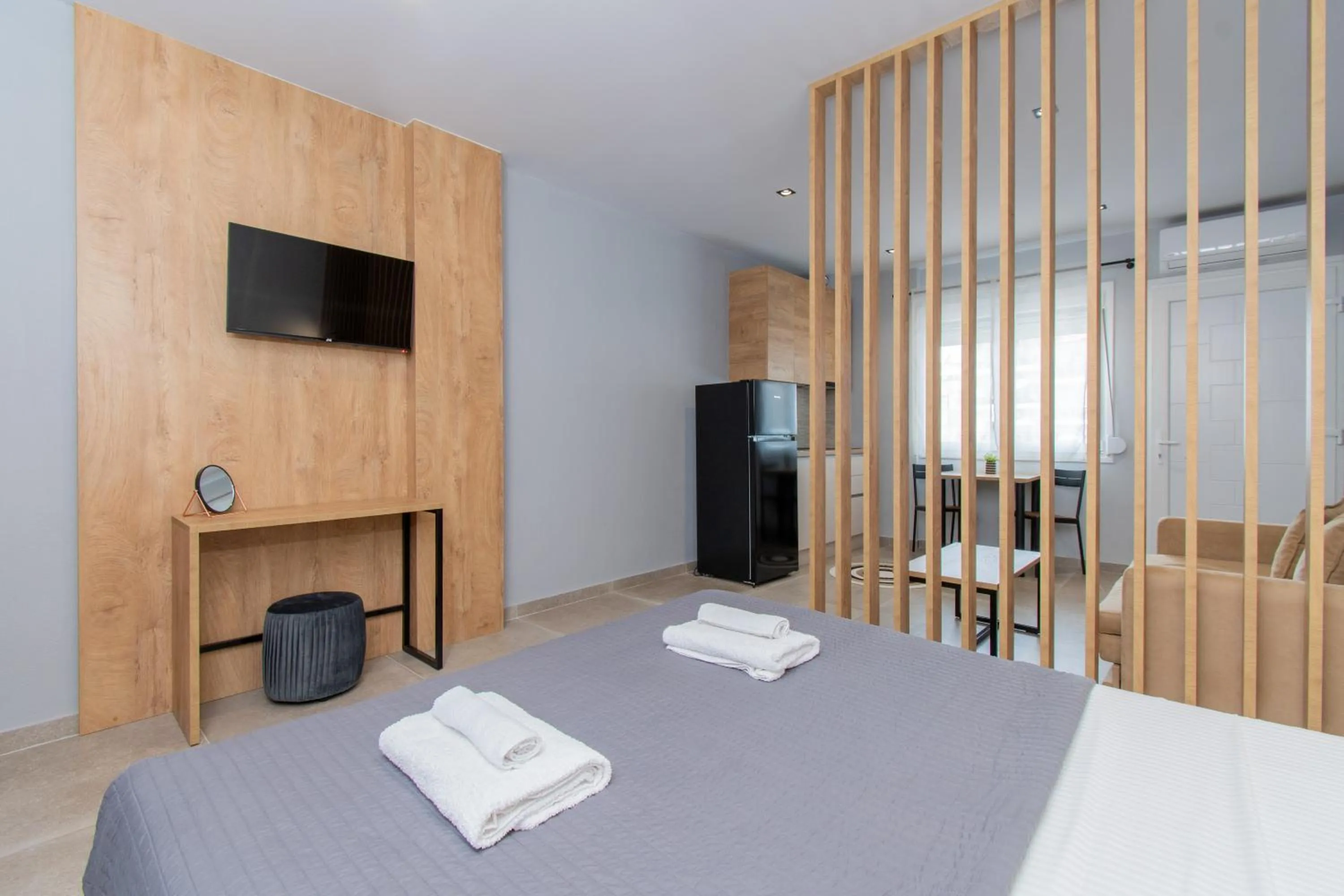 TV and multimedia, Bed in Unique Aura Luxury Studios