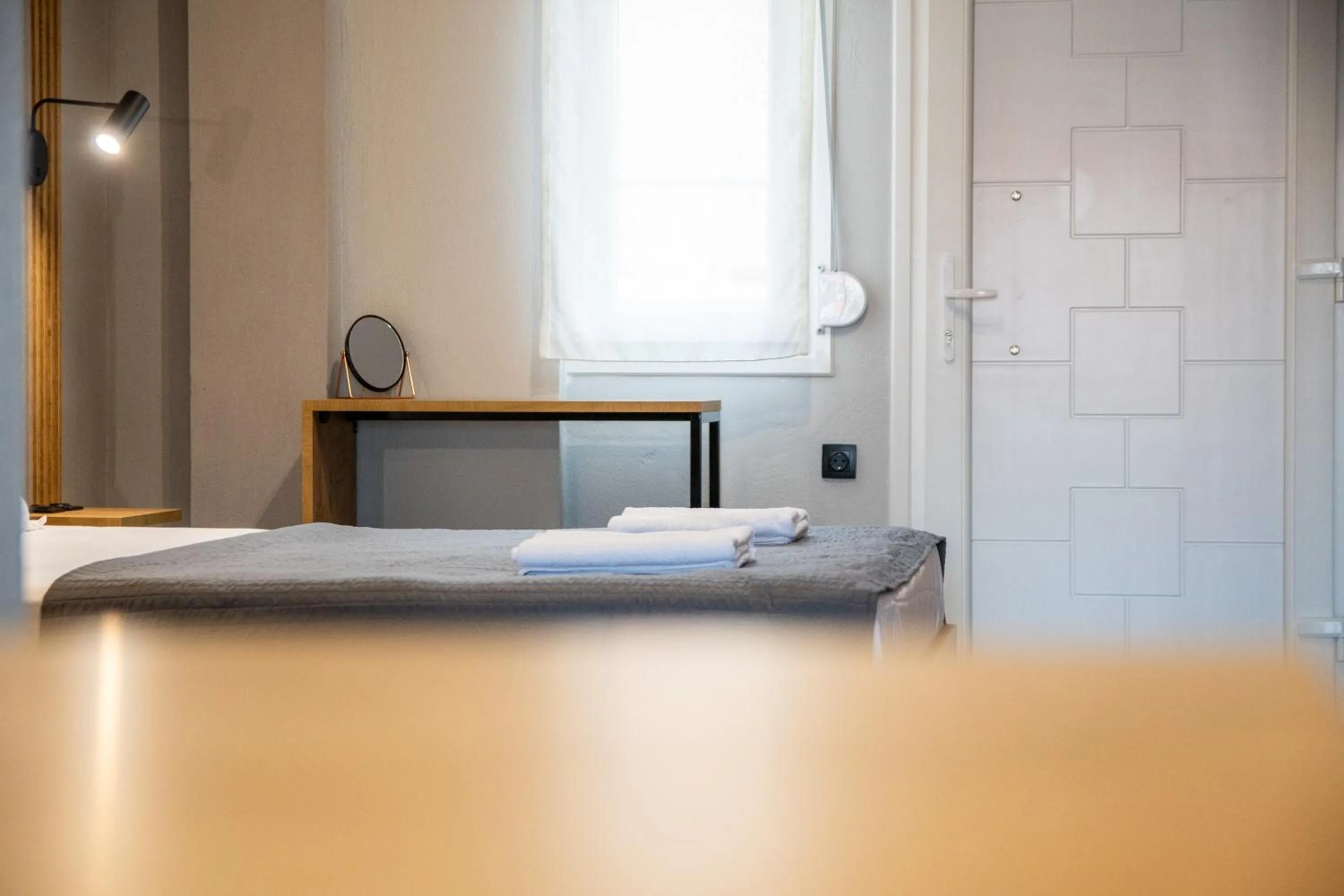 Bed in Unique Aura Luxury Studios