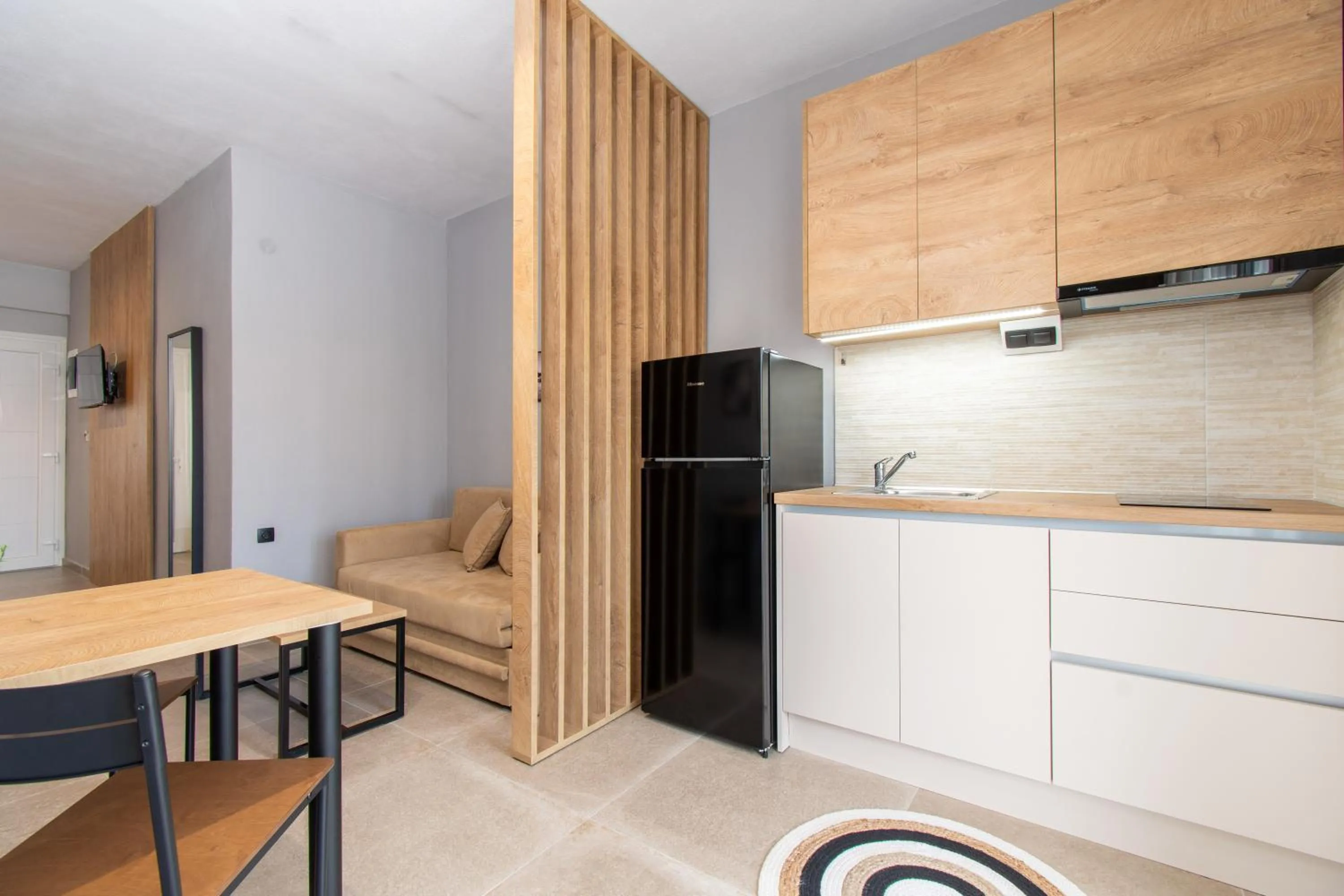 Kitchen or kitchenette in Unique Aura Luxury Studios