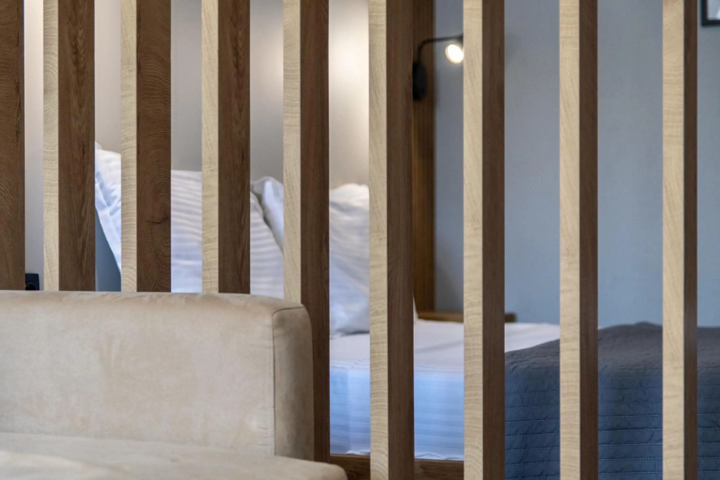 Bed in Unique Aura Luxury Studios