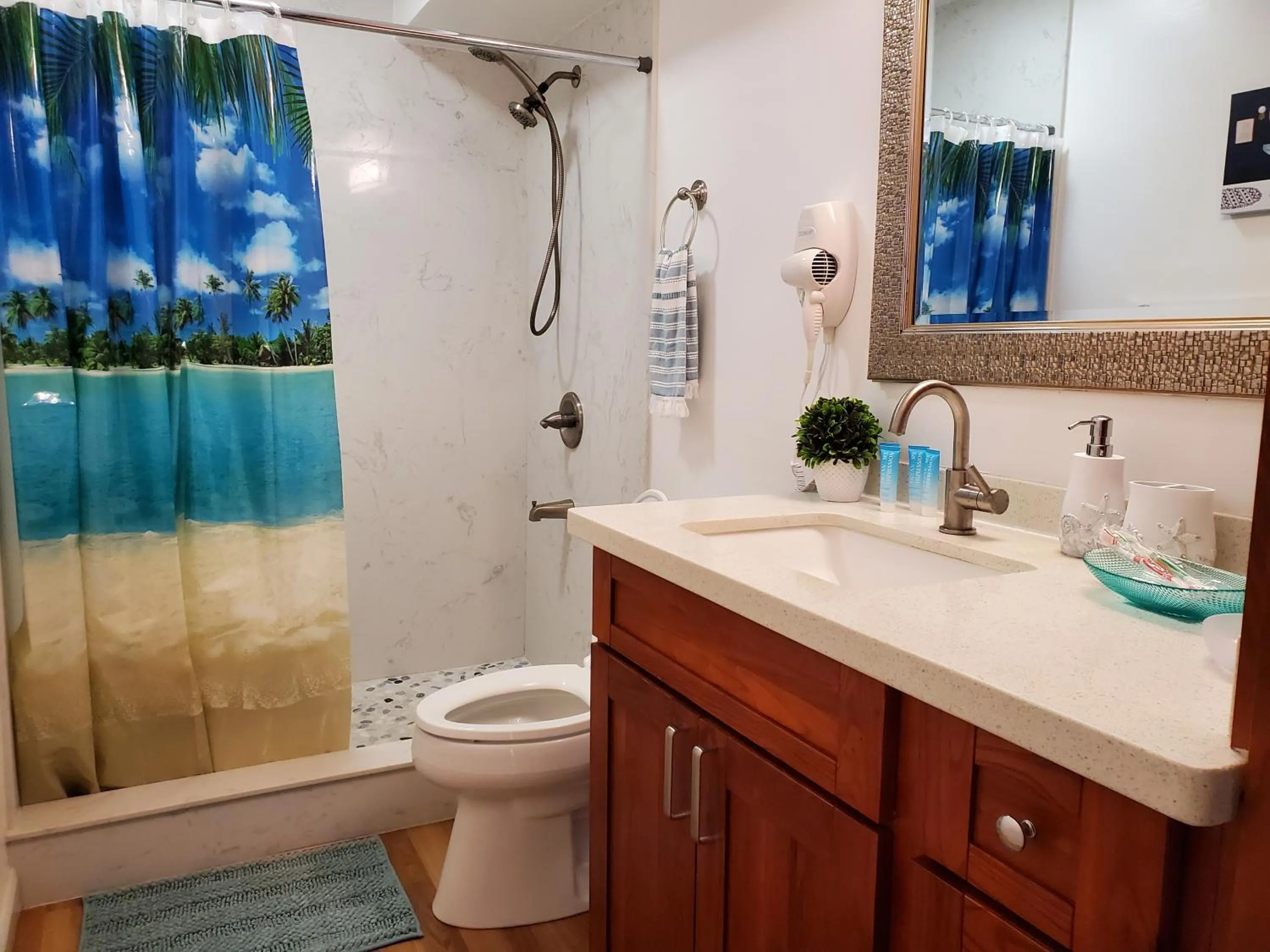 Toilet in Cozy 2beds,2baths, free parking at Waikiki Beach