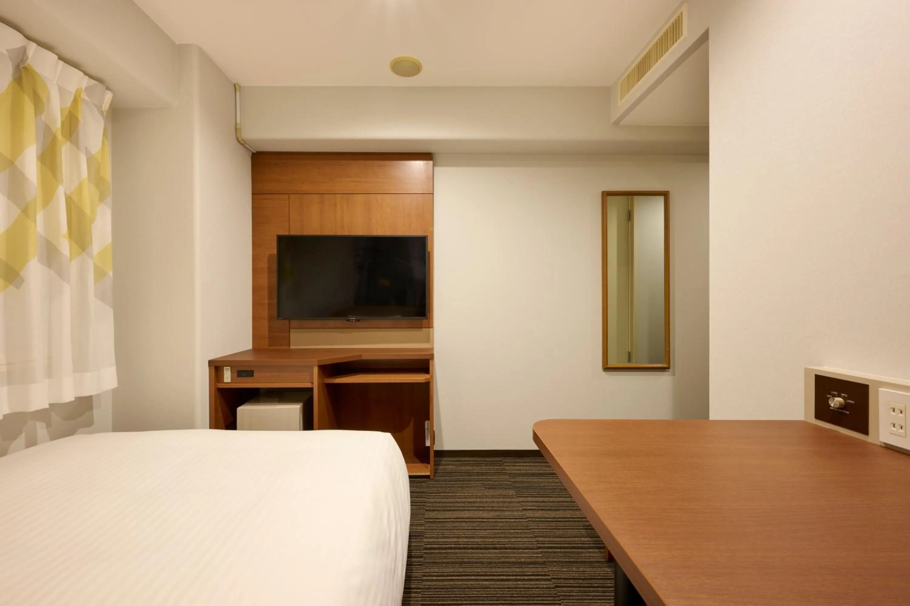 Bed in Via Inn Shin Osaka