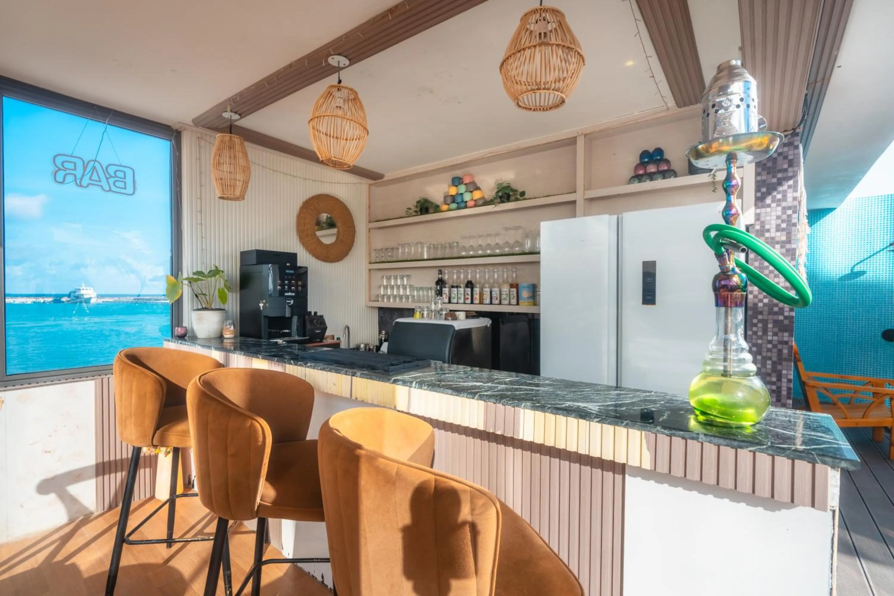 Lounge or bar in Swarn by Hawks Hotels Kamadhoo Baa Atoll