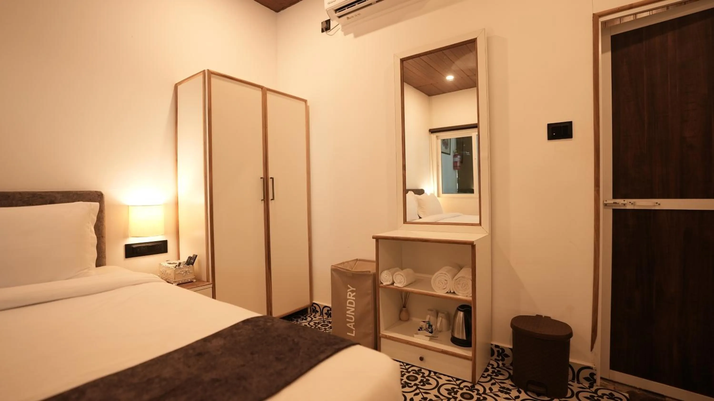 Bed in Whiteflower Cottages Vagator