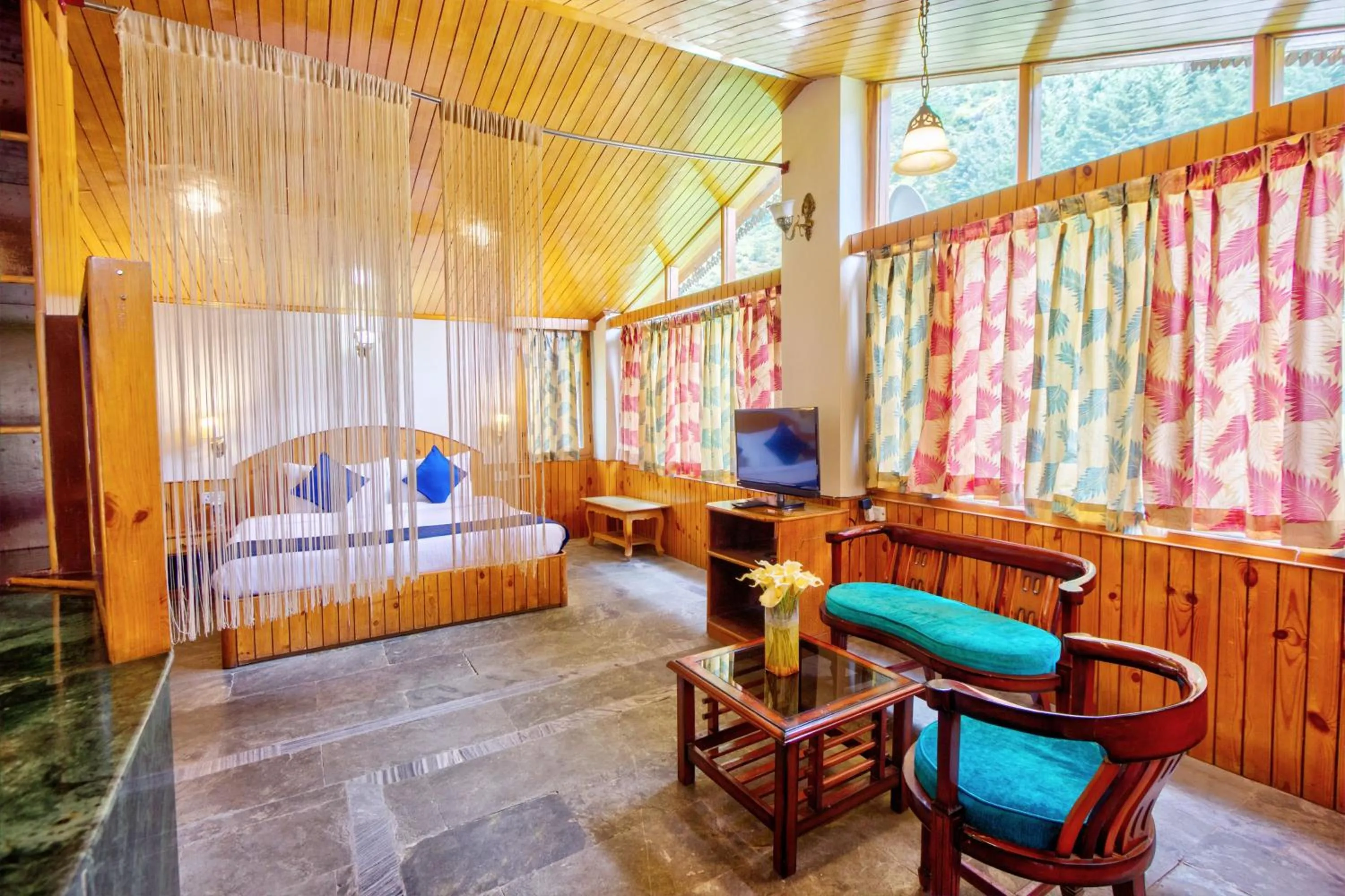 Seating area in PARADISE-The Whitehouse Cafe