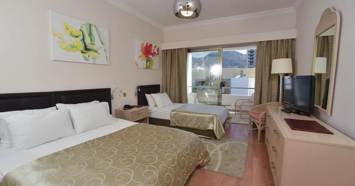 Bedroom in Jasmine Court Hotel & Casino