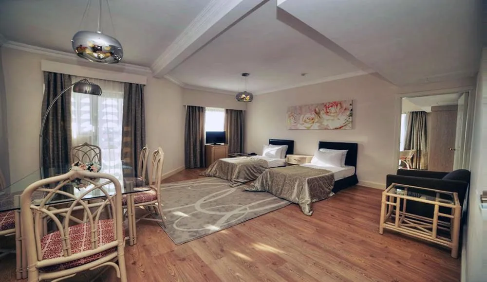 Living room in Jasmine Court Hotel & Casino