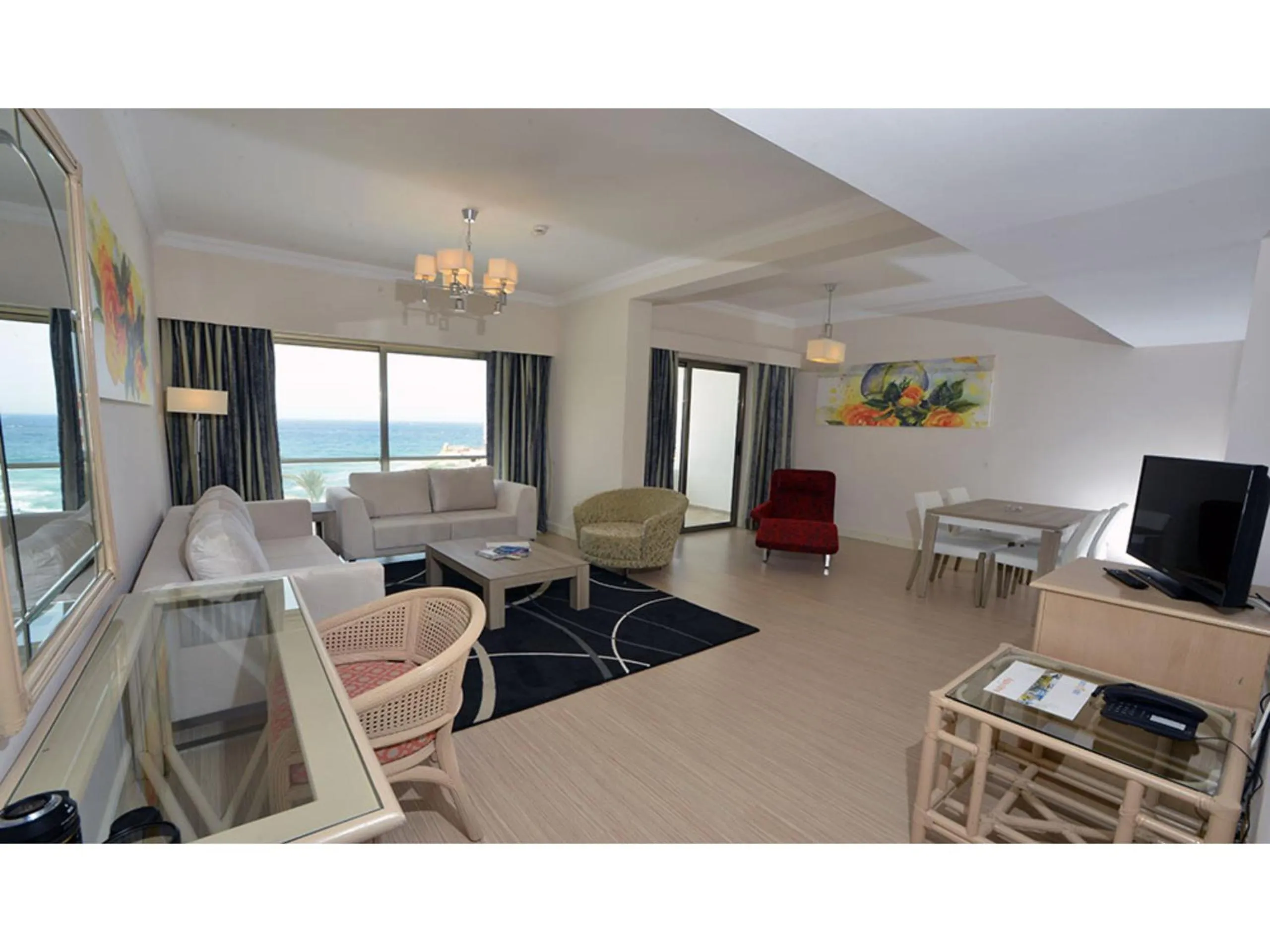 Communal lounge/ TV room in Jasmine Court Hotel & Casino