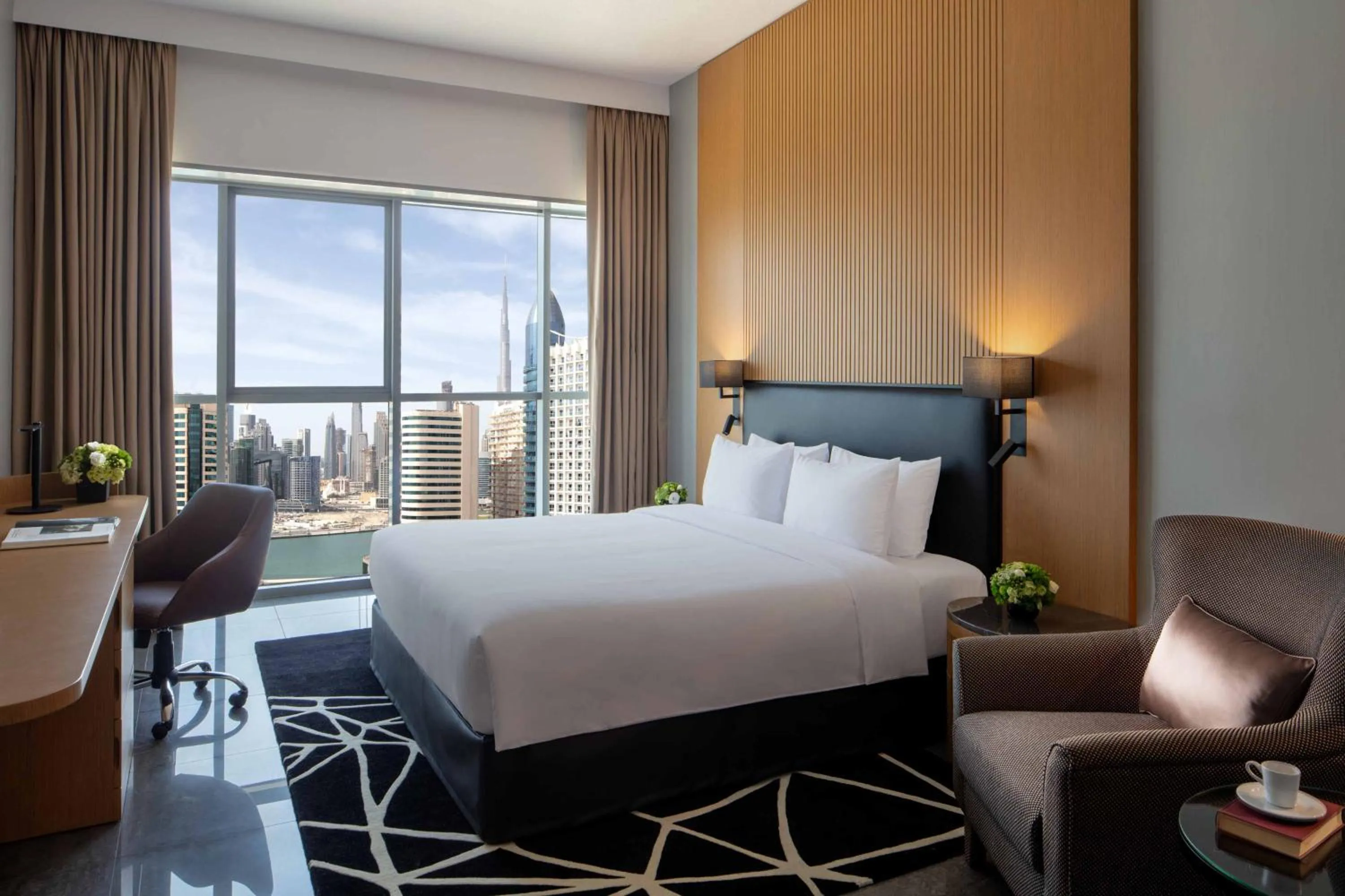 Bedroom, Bed in The First Collection Dubai Business Bay