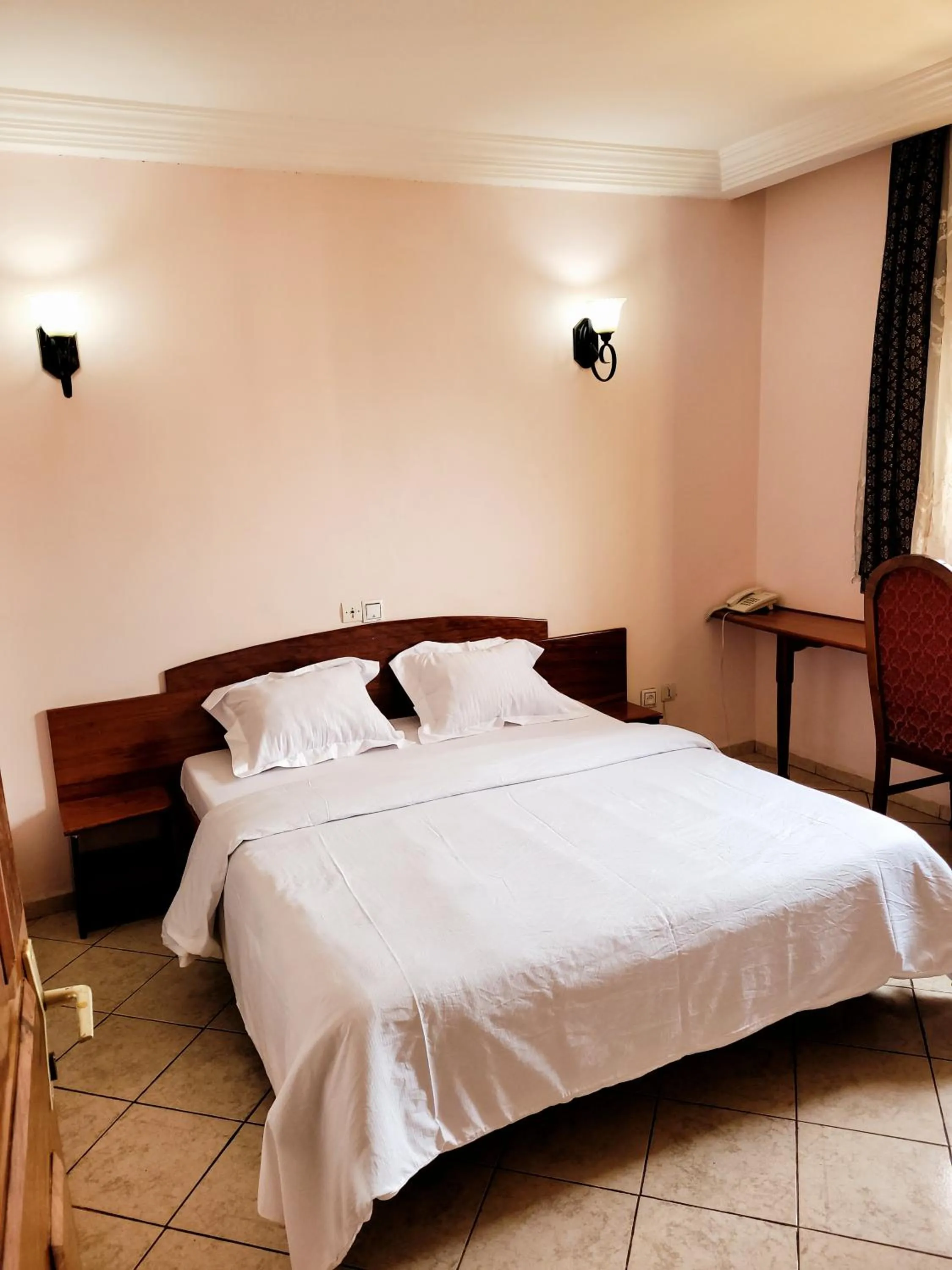 Bedroom in Hôtel Altitel