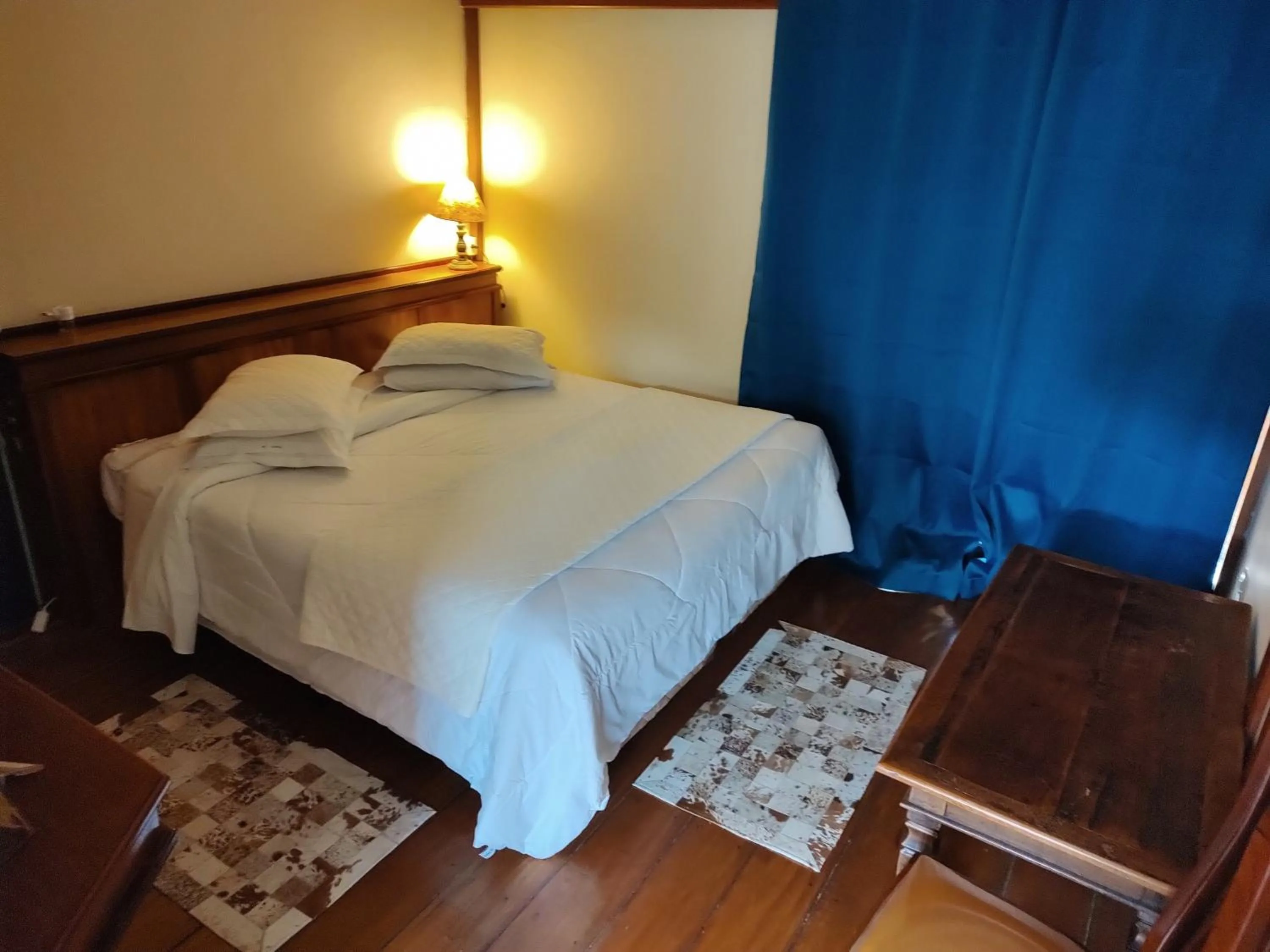 Bed in Pousada Le Lieu