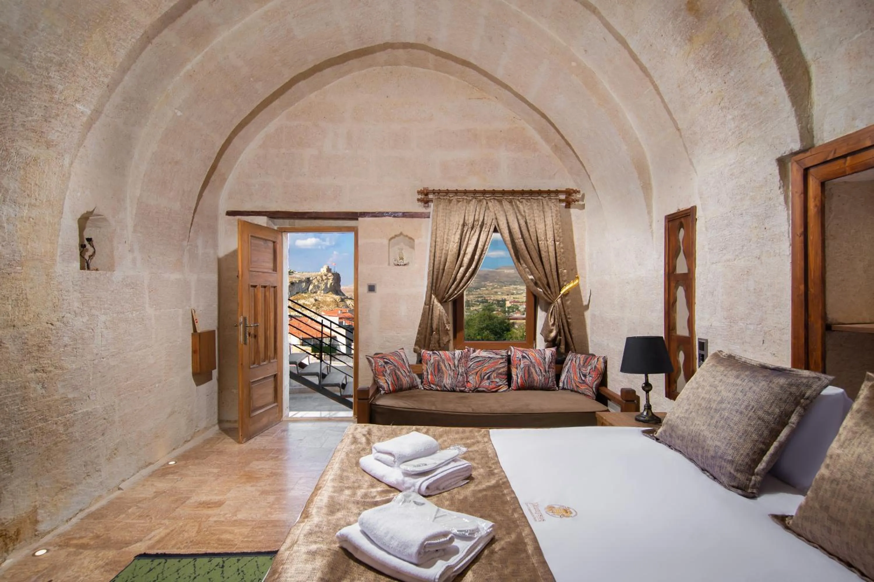 Photo of the whole room, Bed in Dionysos Cave Cappadocia Hotel