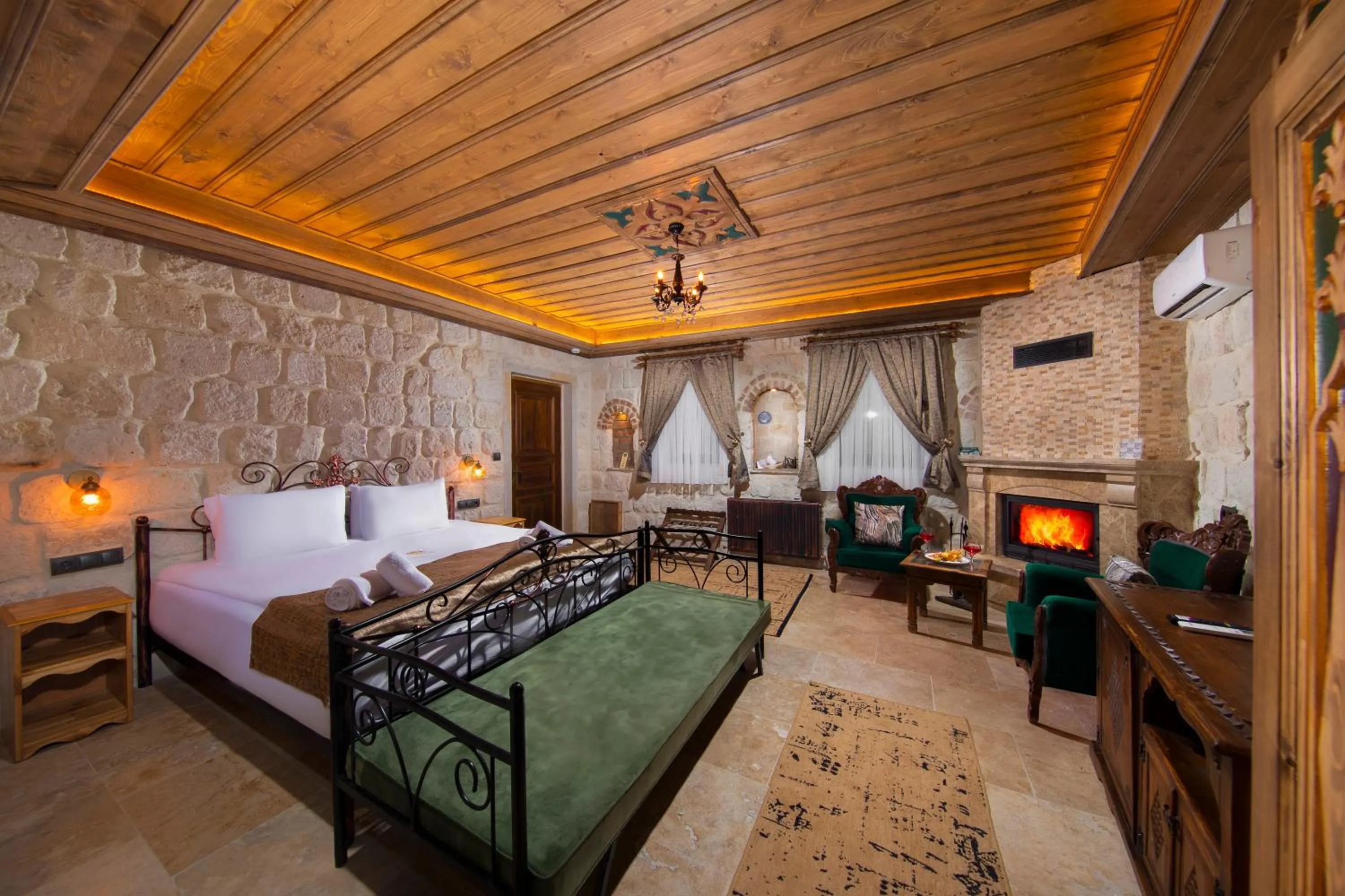 Bed in Dionysos Cave Cappadocia Hotel