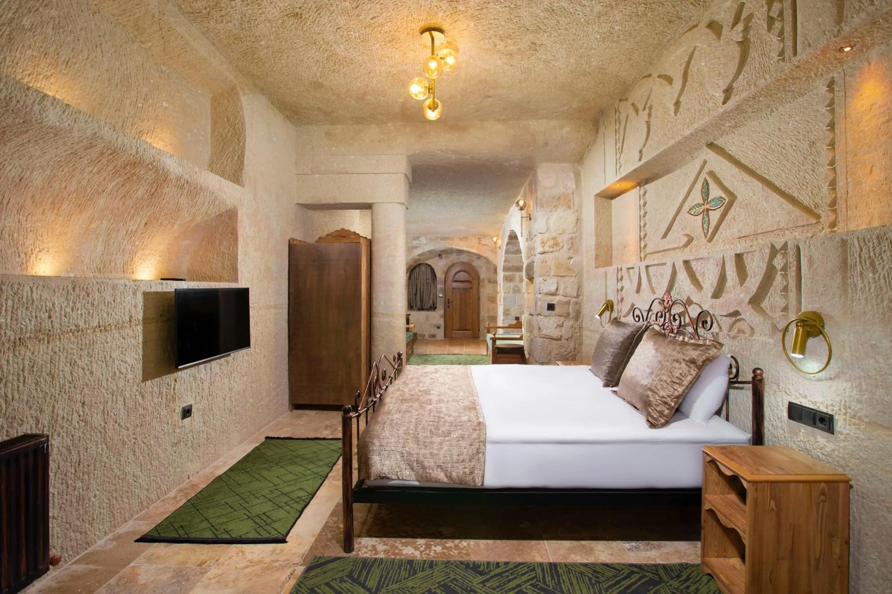 Bed in Dionysos Cave Cappadocia Hotel