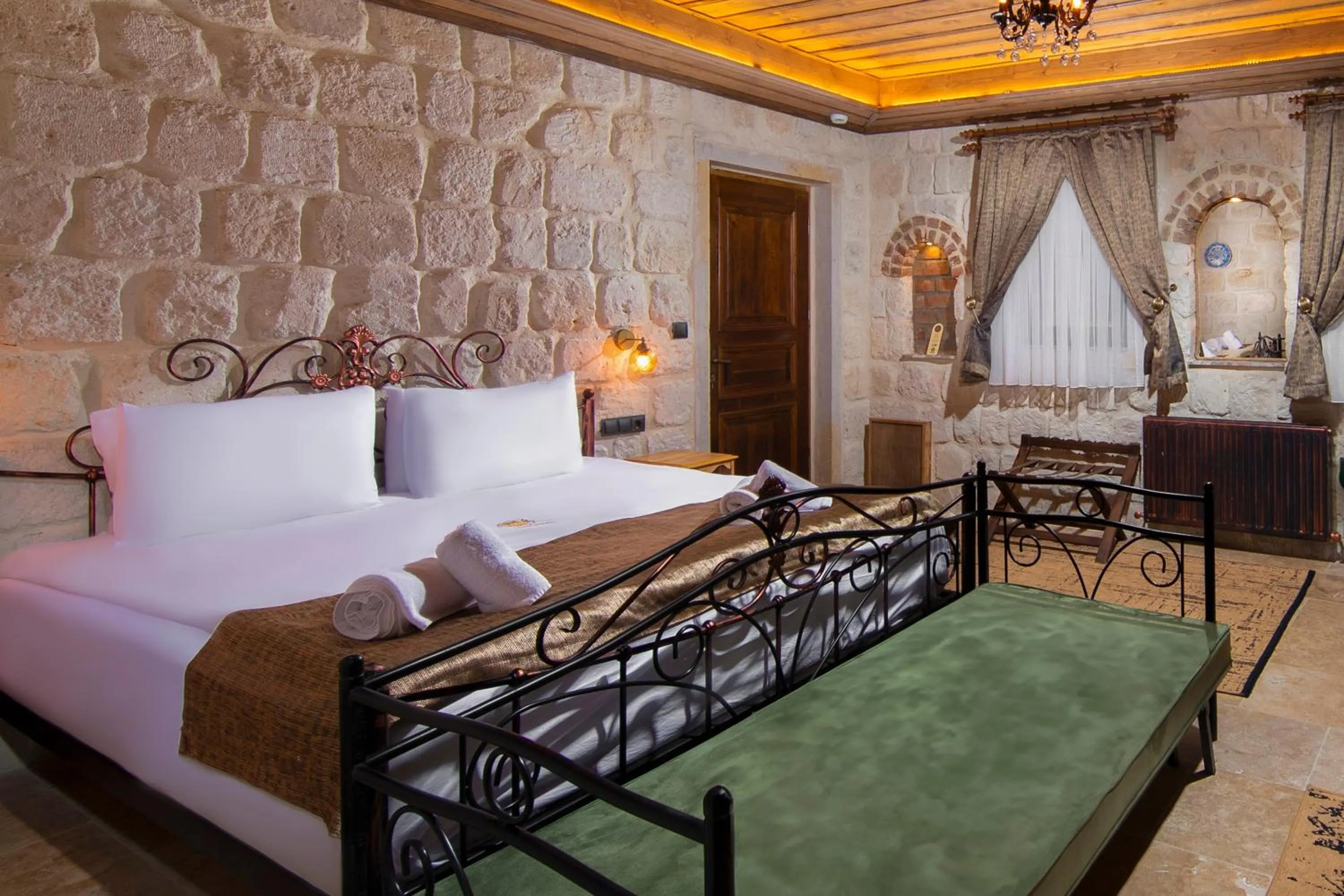 Bed in Dionysos Cave Cappadocia Hotel