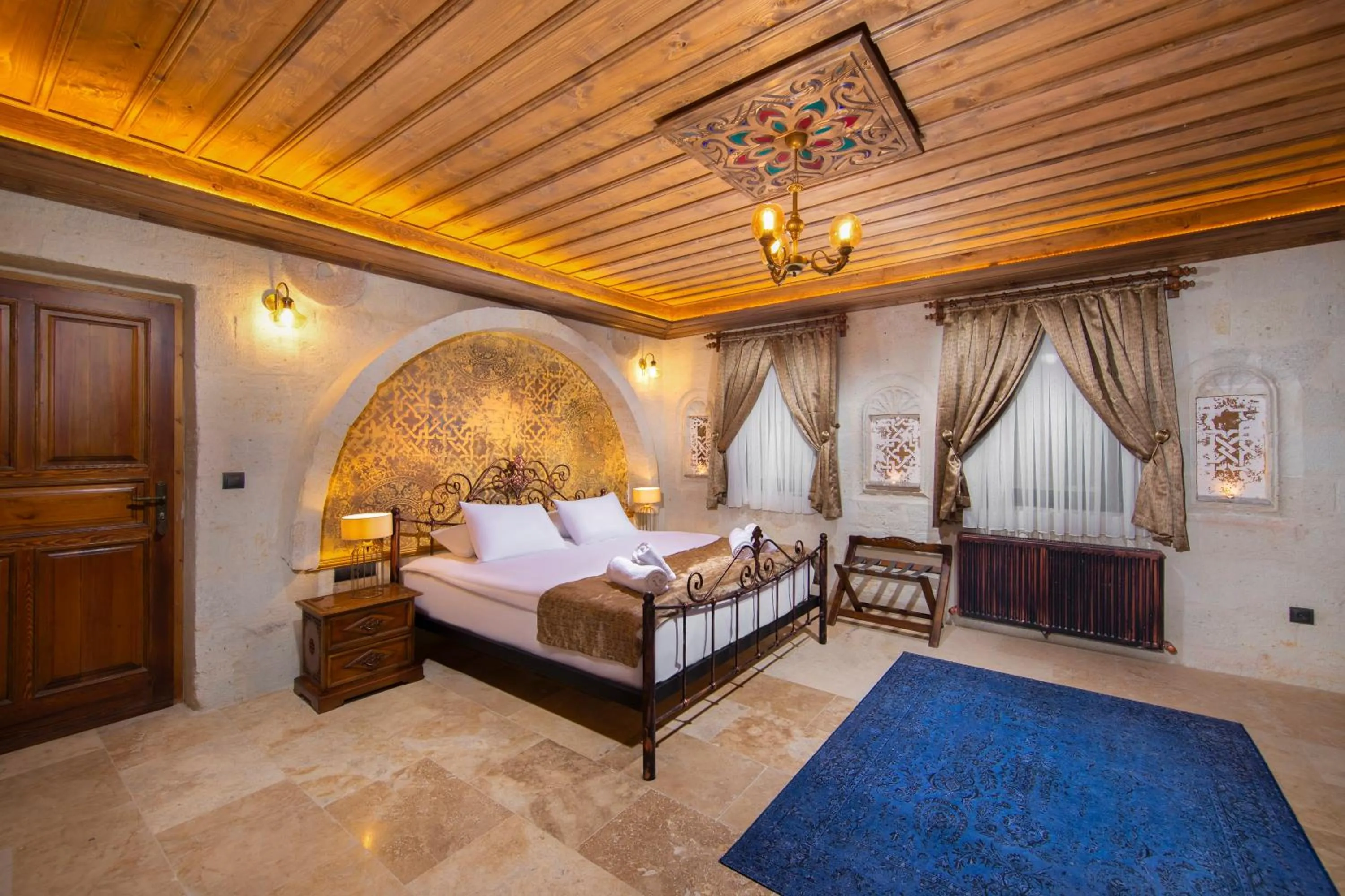 Photo of the whole room, Bed in Dionysos Cave Cappadocia Hotel