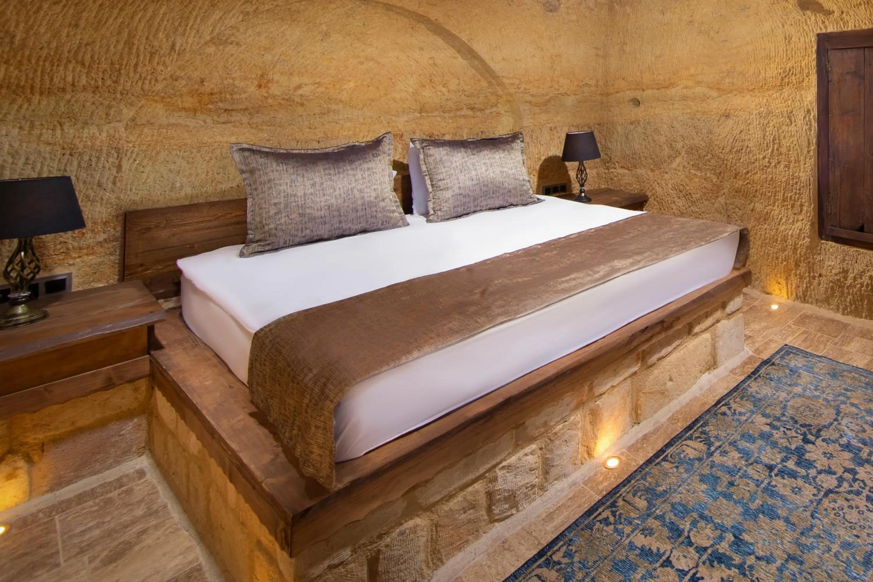 Bed in Dionysos Cave Cappadocia Hotel